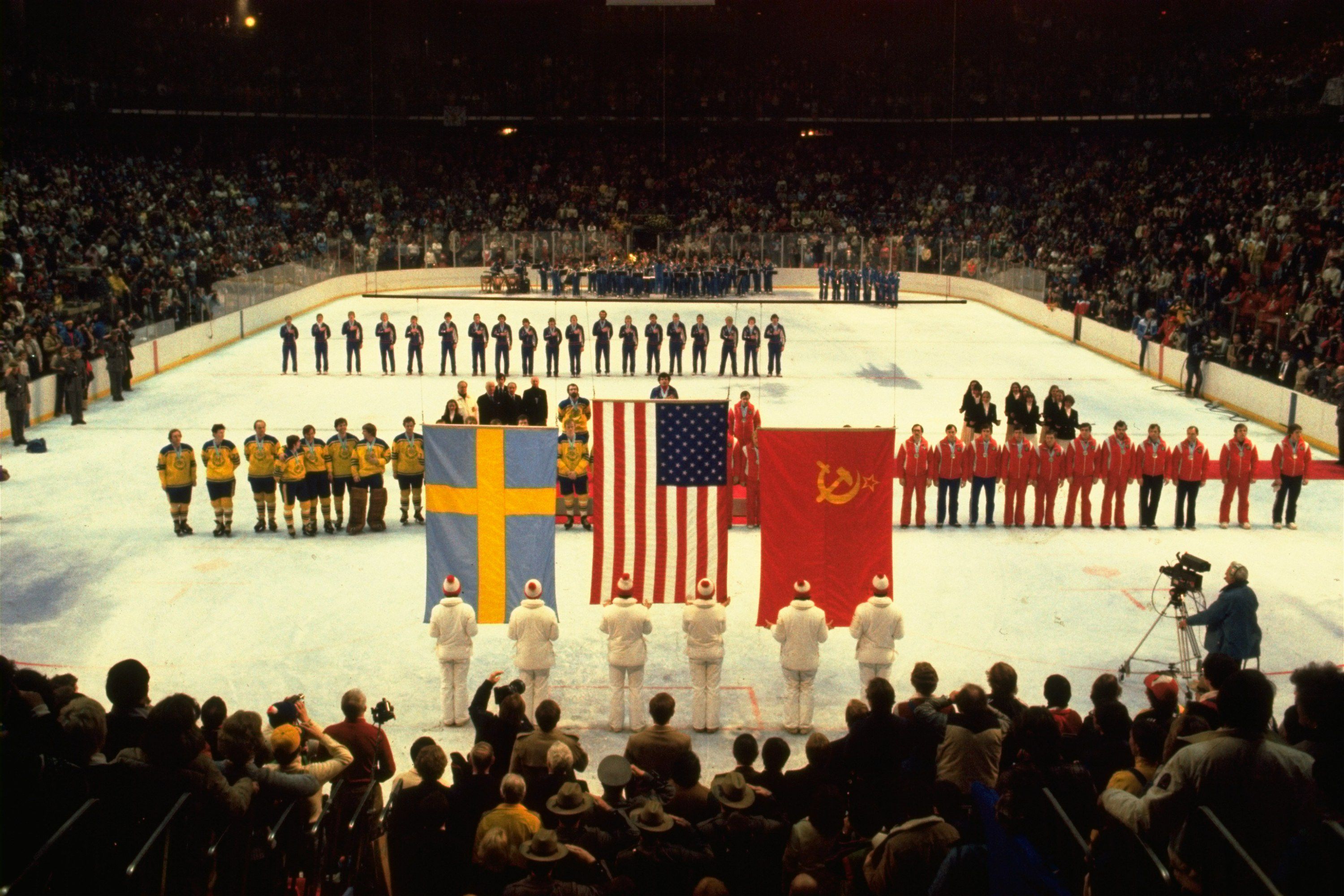 The U.S., Swedish and Soviet hockey teams line up to receive their Olympic gold, bronze and silver medals in Lake Placid, N.Y., on Feb. 24, 1980. Lake Placid, the New York village that hosted the 1932 and 1980 Winter Games, would be paired with someplace else for another bid under legislation passed last week by the New York State Assembly that creates a commission to recommend that partner.