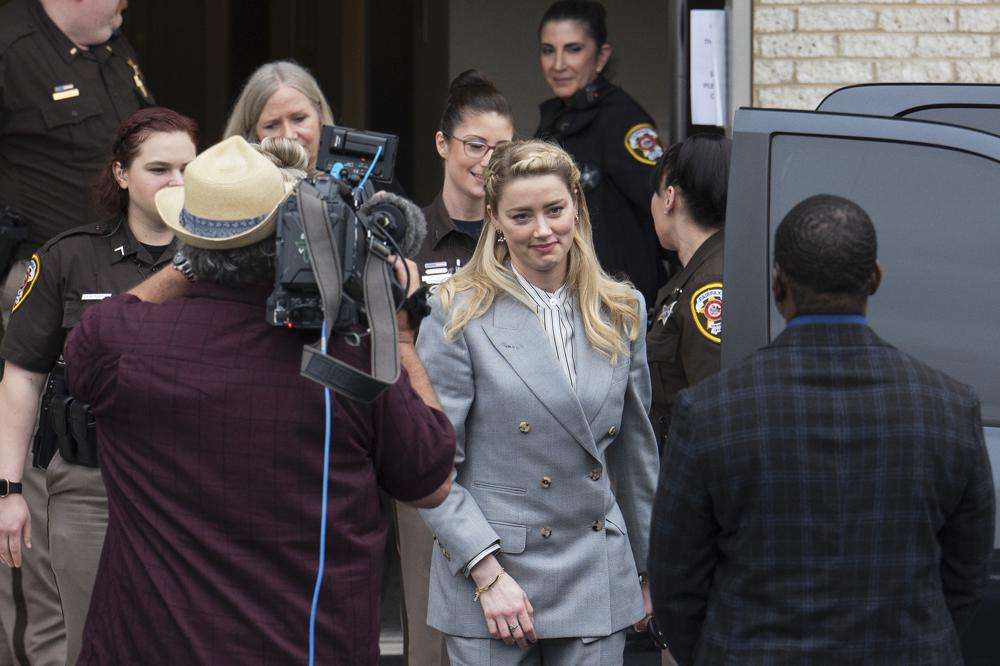 Actress Amber Heard departs the Fairfax County Courthouse Friday, in Fairfax, Va. A jury heard closing arguments in Johnny Depp's high-profile libel lawsuit against ex-wife Amber Heard.
A jury awarded Depp more than $10 million on Wednesday in his libel lawsuit against ex-wife Heard.