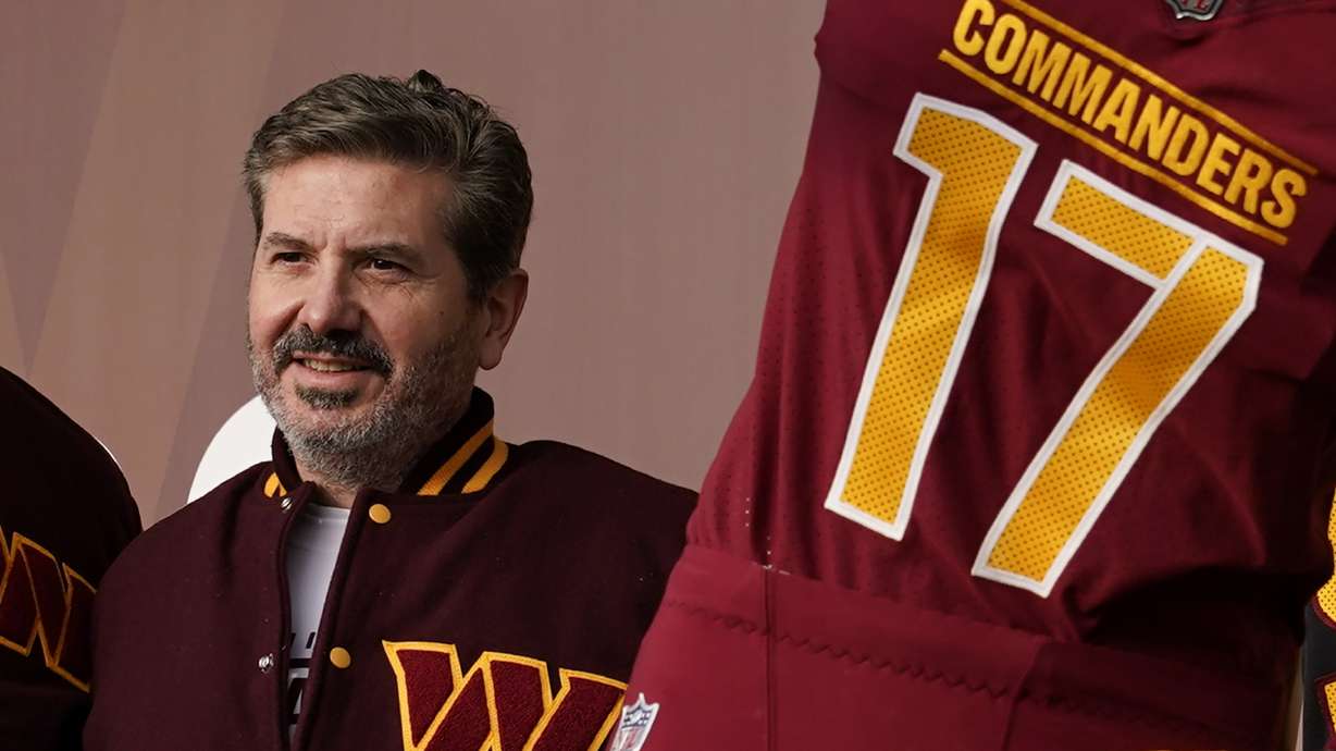 FILE - Dan Snyder, co-owner and co-CEO of the Washington Commanders, poses for photos during an event to unveil the NFL football team's new identity, Wednesday, Feb. 2, 2022, in Landover, Md. A person with knowledge of the situation tells The Associated Press the Washington Commanders have bought land in Virginia for what could be a potential site of the NFL team’s next stadium. The 200 acres of land purchased for approximately $100 million is in Woodbridge roughly 25 miles outside the District of Columbia. The Commanders’ lease at FedEx Field in Landover, Maryland, expires in 2027.