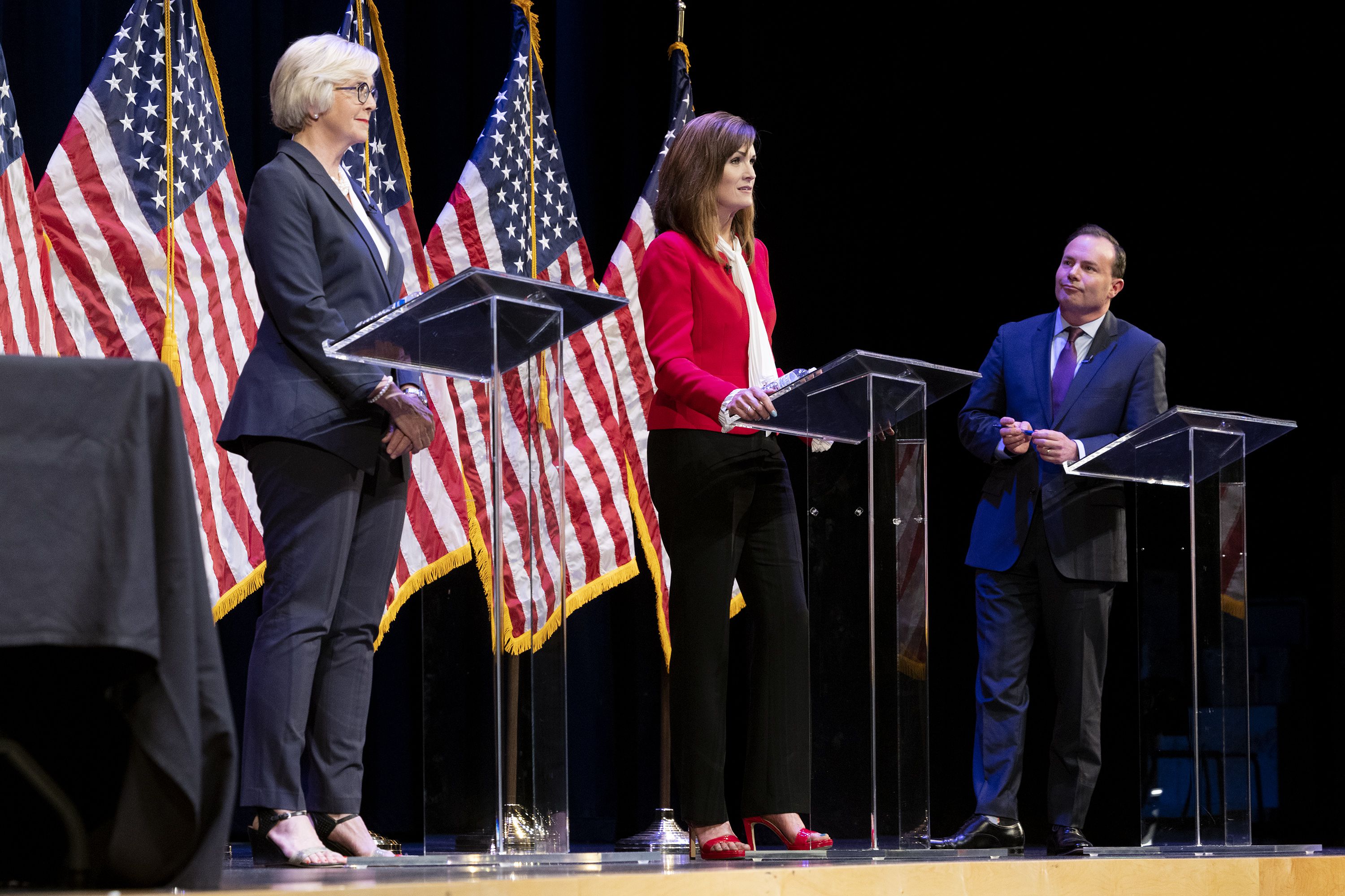 Becky Edwards, Ally Isom and Sen. Mike Lee participate in a Utah GOP-sponsored debate at Draper Park Middle School in Draper on Wednesday. Utah's Republican incumbent Sen. Mike Lee faced no shortage of attacks Wednesday from his GOP opponents in what was the first — and likely the only — public face-off between the trio before the Utah GOP primary June 28.