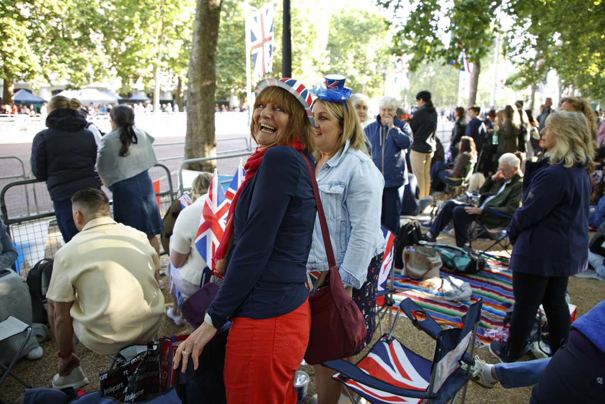 Royal fans gather along the Mall leading to Buckingham Palace in London, Thursday on the first of four days of celebrations to mark the Platinum Jubilee.