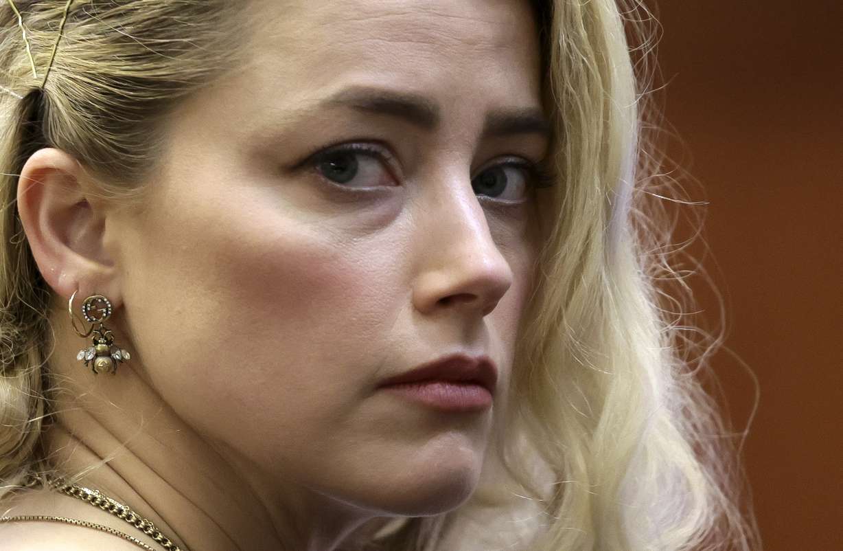 Actor Amber Heard waits before the verdict was read at the Fairfax County Circuit Courthouse in Fairfax, Va, Wednesday.