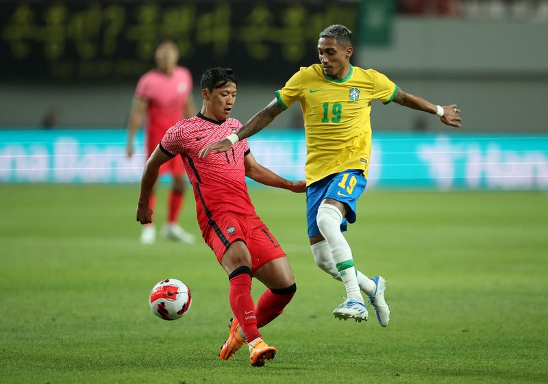 Soccer Football - International Friendly - South Korea v Brazil - Seoul World Cup Stadium, Seoul, South Korea - June 2, 2022 Brazil's Raphinha in action with South Korea's Hwang Hee-Chan