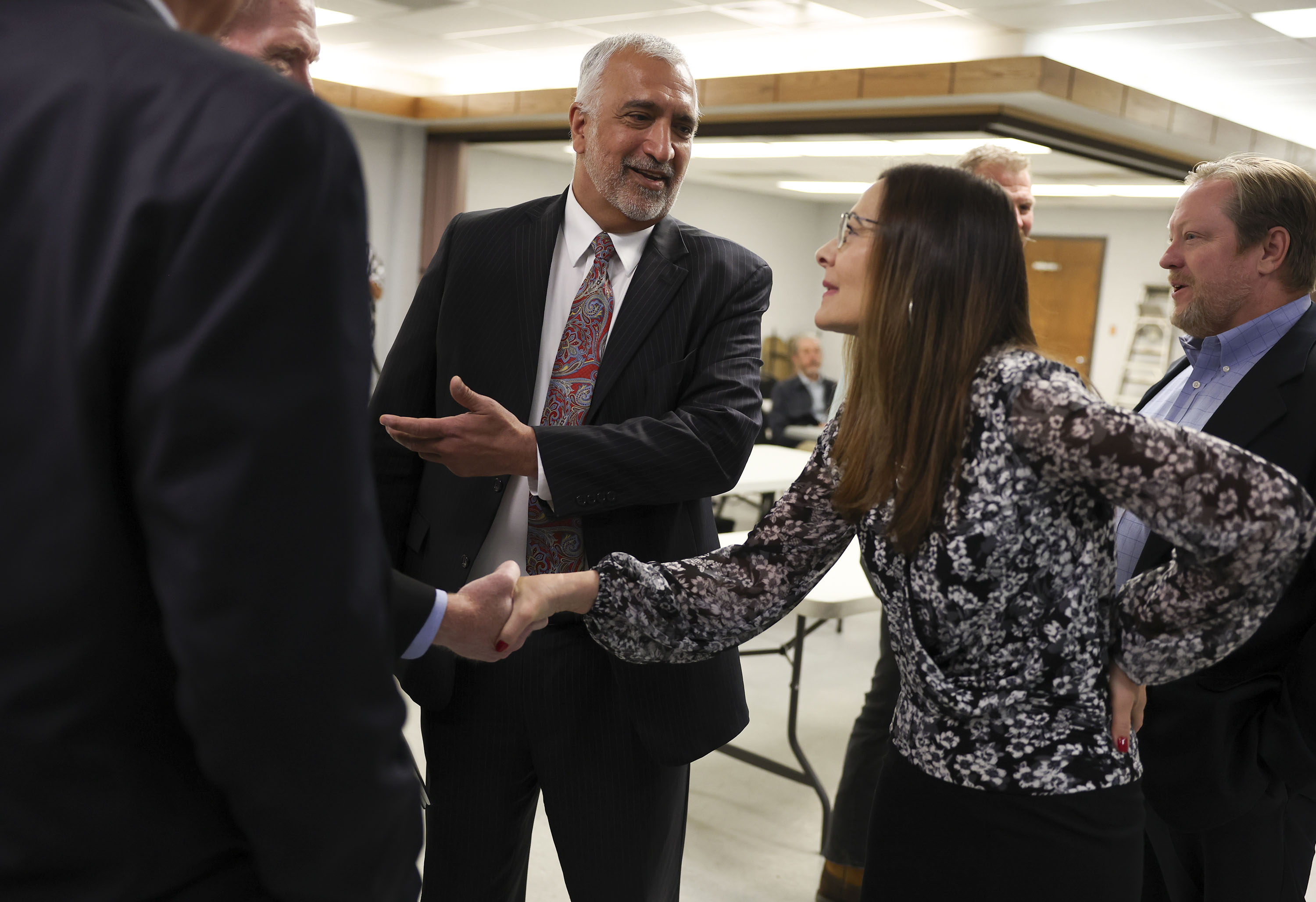 Salt Lake County District Attorney Sim Gill, third from left, introduces his wife, Jamie Tabish, prior to a press conference announcing his campaign for reelection at the Union Labor Center in Salt Lake City on Wednesday.