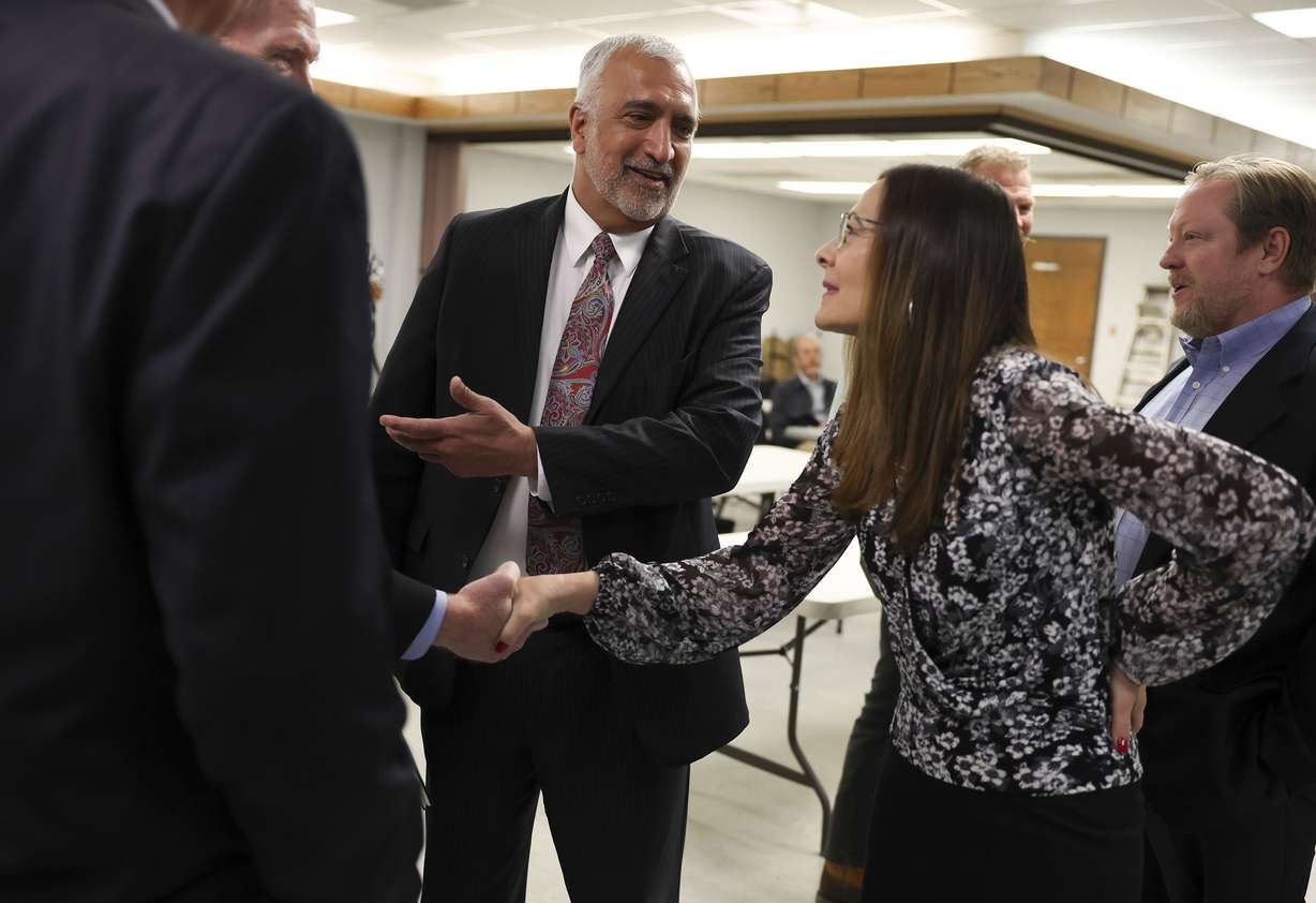 Salt Lake County District Attorney Sim Gill, third from left, introduces his wife, Jamie Tabish, prior to a press conference announcing his campaign for reelection at the Union Labor Center in Salt Lake City on Wednesday.