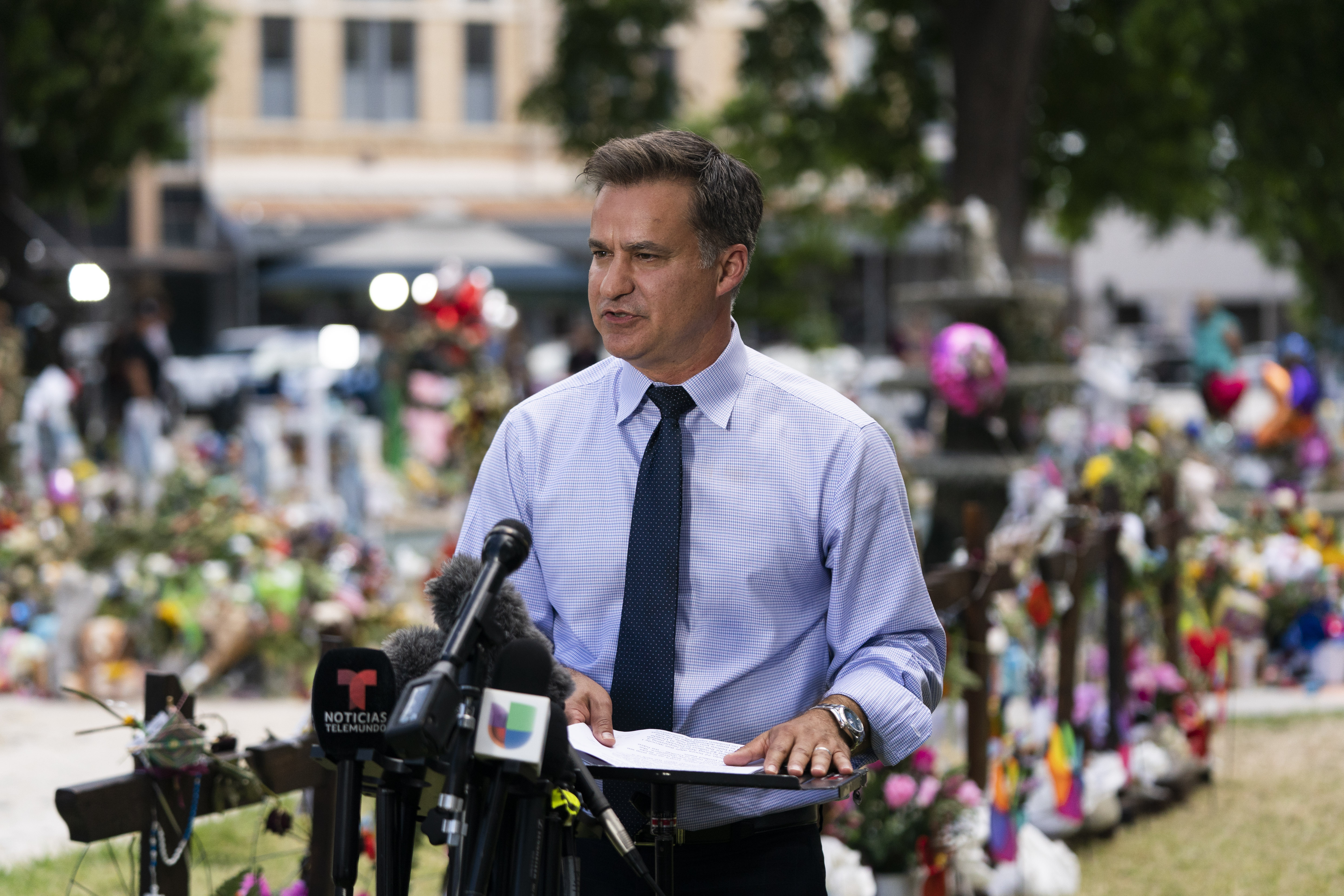 Texas state Sen. Roland Gutierrez speaks during a news conference at a town square in Uvalde, Texas, Thursday. Gutierrez said the commander at the scene of a shooting at Robb Elementary School was not informed of panicked 911 calls from inside the school building.