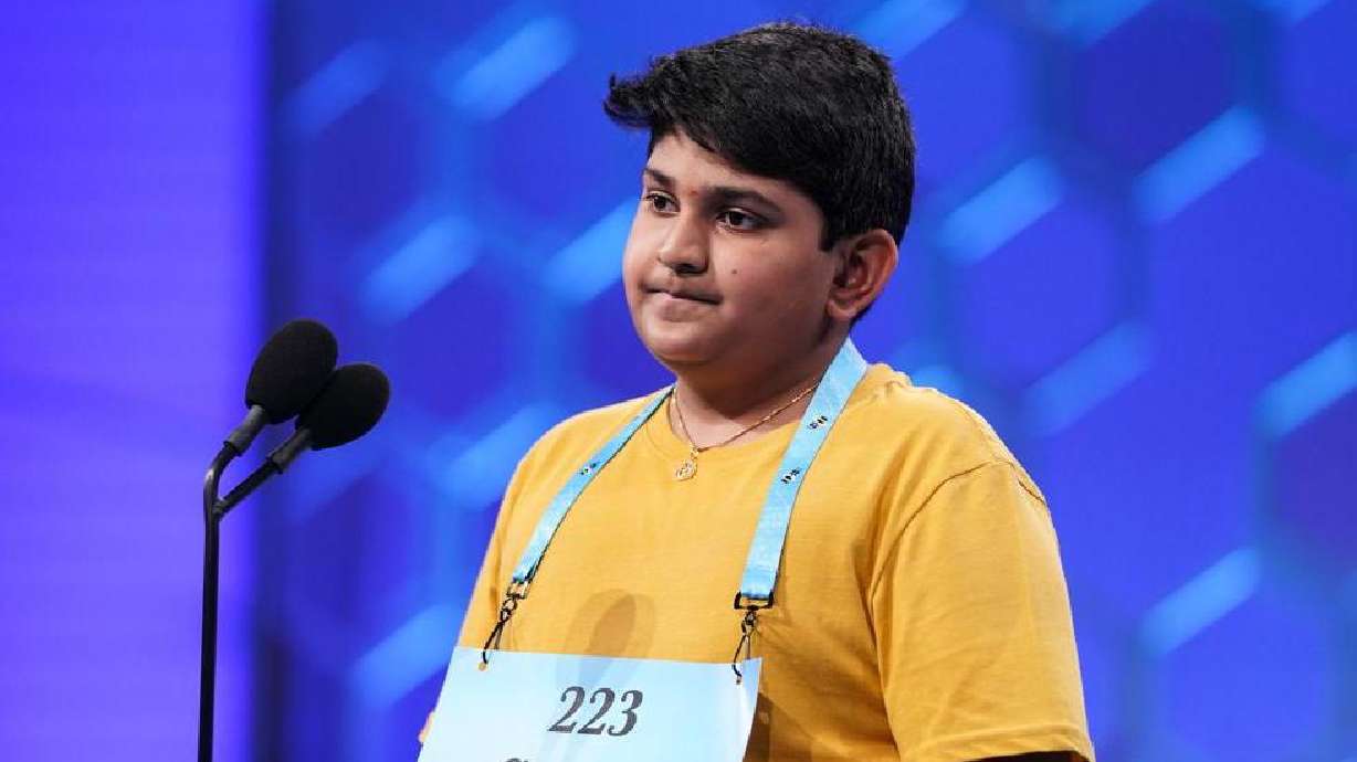 Surya Kapu, 13, from South Jordan, competes during the Scripps National Spelling Bee, Wednesday in Oxon Hill, Md. Kapu has been reinstated into the Scripps National Spelling Bee field after successfully appealing that he was denied relevant root information about a word.
