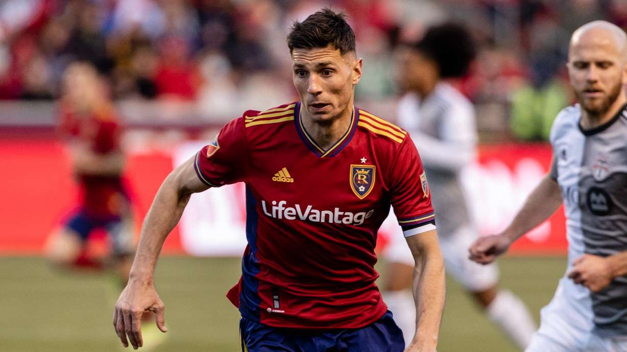 Damir Kreilach dribbles ahead of Michael Bradley in a match against Toronto FC on April 9 at Rio Tinto Stadium.