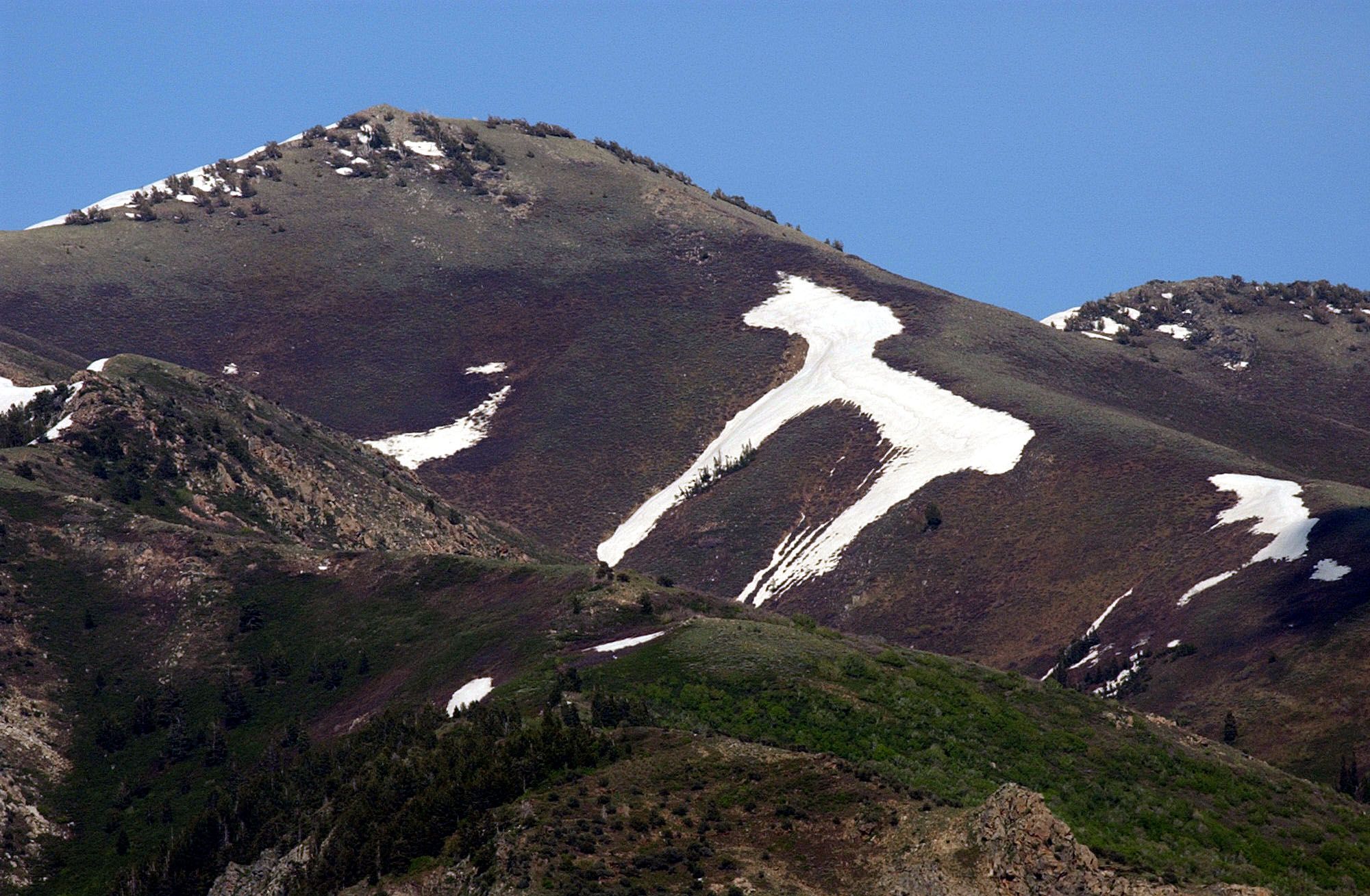 The so-called “snow horse” is seen on a mountain east of Layton on June 3, 2002. Millions of residents of southern California are now limited to one day a week of outdoor irrigation, just like a huge chunk of northern Utah.