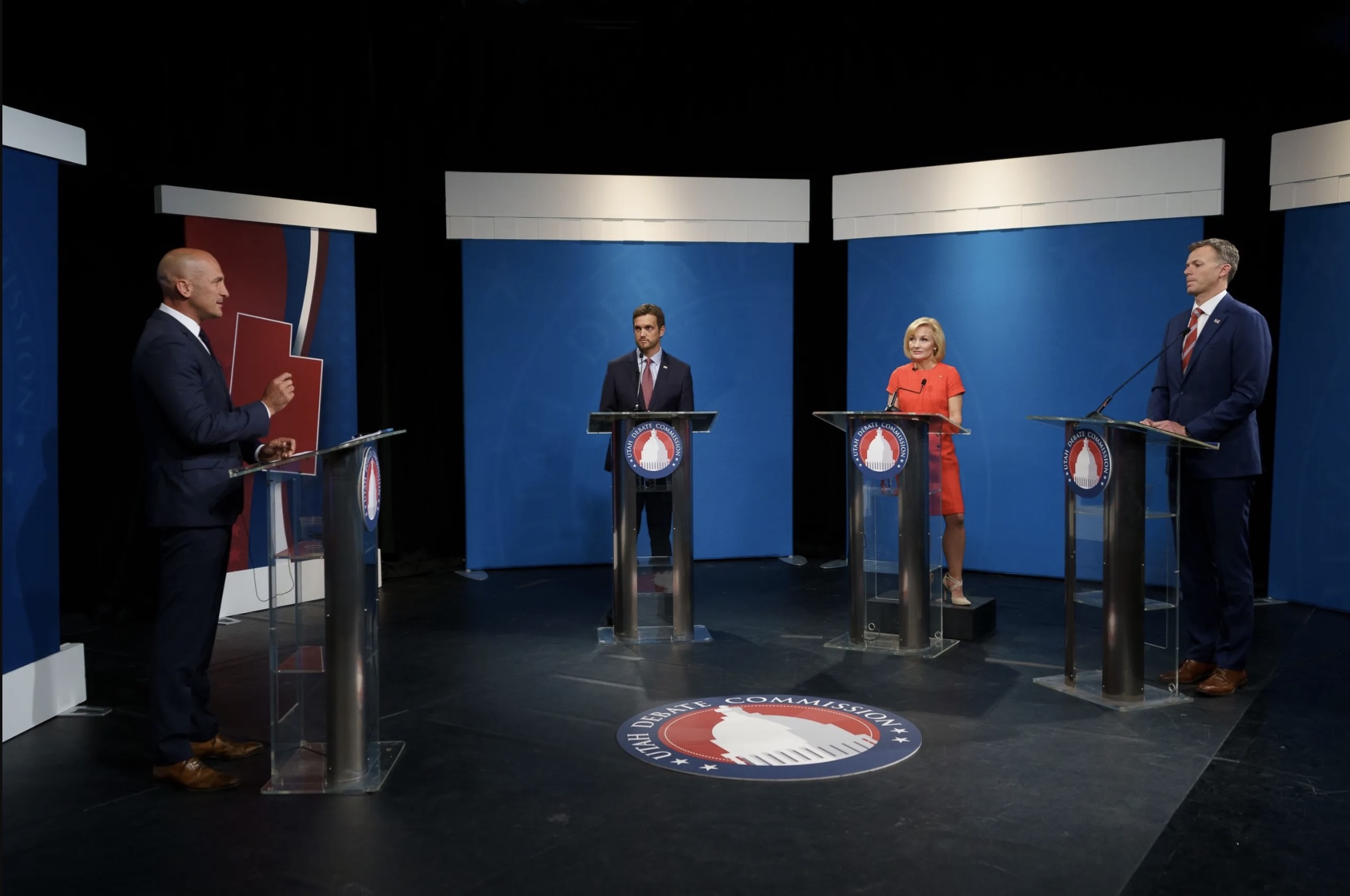 Andrew Badger, second from left, Tina Cannon and Rep. Blake Moore, R-Utah, take questions from Thomas Wright, a former Utah Republican Party chairman, far left, during the 1st Congressional District Republican primary debate in Salt Lake City on Thursday.