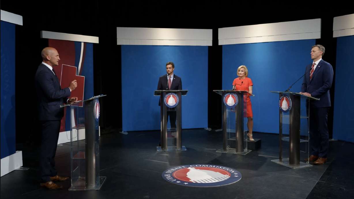 Andrew Badger, second from left, Tina Cannon and Rep. Blake Moore, R-Utah, take questions from Thomas Wright, a former Utah Republican Party chairman, far left, during the 1st Congressional District Republican primary debate in Salt Lake City on Thursday.