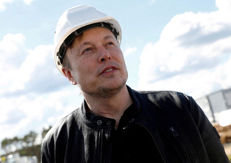 SpaceX founder and Tesla CEO Elon Musk visits the construction site of Tesla's gigafactory in Gruenheide, near Berlin, Germany, May 17, 2021. He said Thursday he has a "super bad feeling" about the economy and needs to cut about 10% of jobs at the electric carmaker.