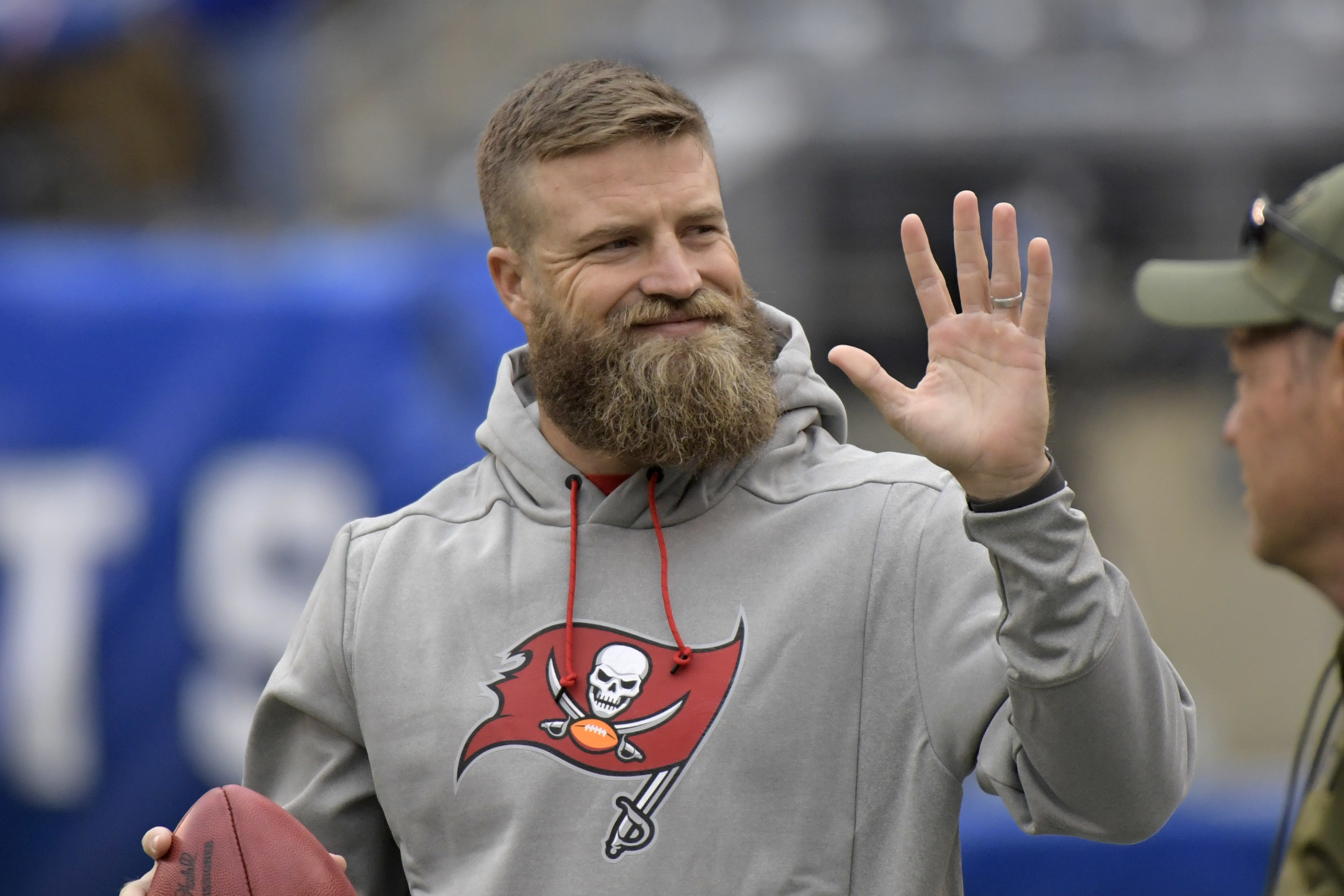 FILE - Tampa Bay Buccaneers quarterback Ryan Fitzpatrick waves to fans before an NFL football game against the New York Giants, Sunday, Nov. 18, 2018, in East Rutherford, N.J. Quarterback Ryan Fitzpatrick confirmed to The Associated Press on Friday, June 3, 2022, that he informed former teammates of his intention to retire a day earlier. Former Bills running back Fred Jackson first announced the news of Fitzpatrick’s retirement on his Twitter account by posting an image and message from his former Buffalo teammate. 