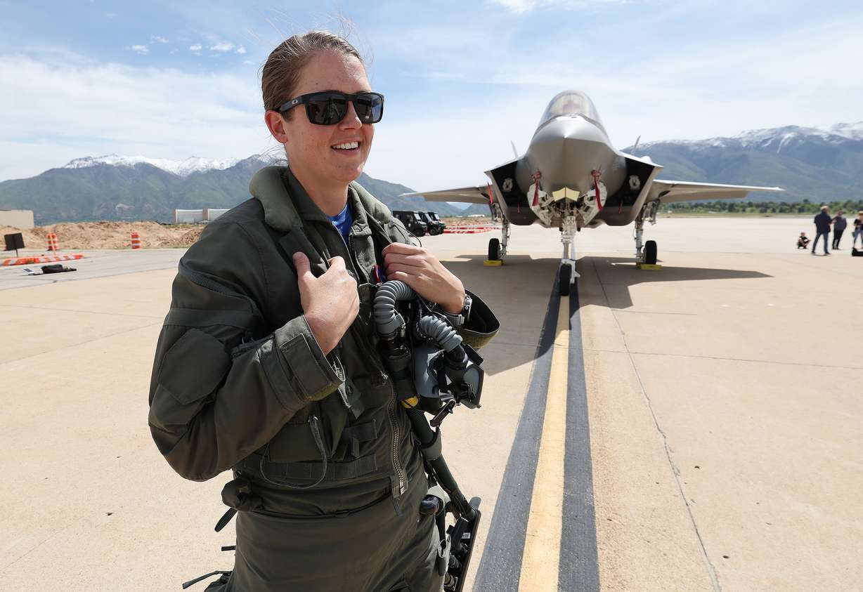 Maj. Kristin “BEO” Wolfe smiles after flying during an F-35A Lightning II demonstration team show at Hill Air Force Base near Layton on Friday. Wolfe could be seen high up in the skies over the Wasatch mountains, performing aerial maneuvers during an F-35A Lightning II Demonstration Team practice show in preparation for the upcoming Warriors Over the Wasatch Air and Space Show.