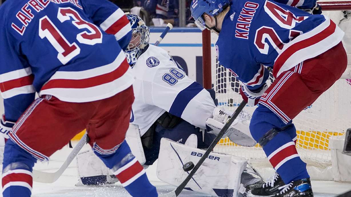New York Rangers right wing Kaapo Kakko (24) scores on Tampa Bay Lightning goaltender Andrei Vasilevskiy (88) in the first period of Game 2 of the NHL hockey Stanley Cup playoffs Eastern Conference finals, Friday, June 3, 2022, in New York.