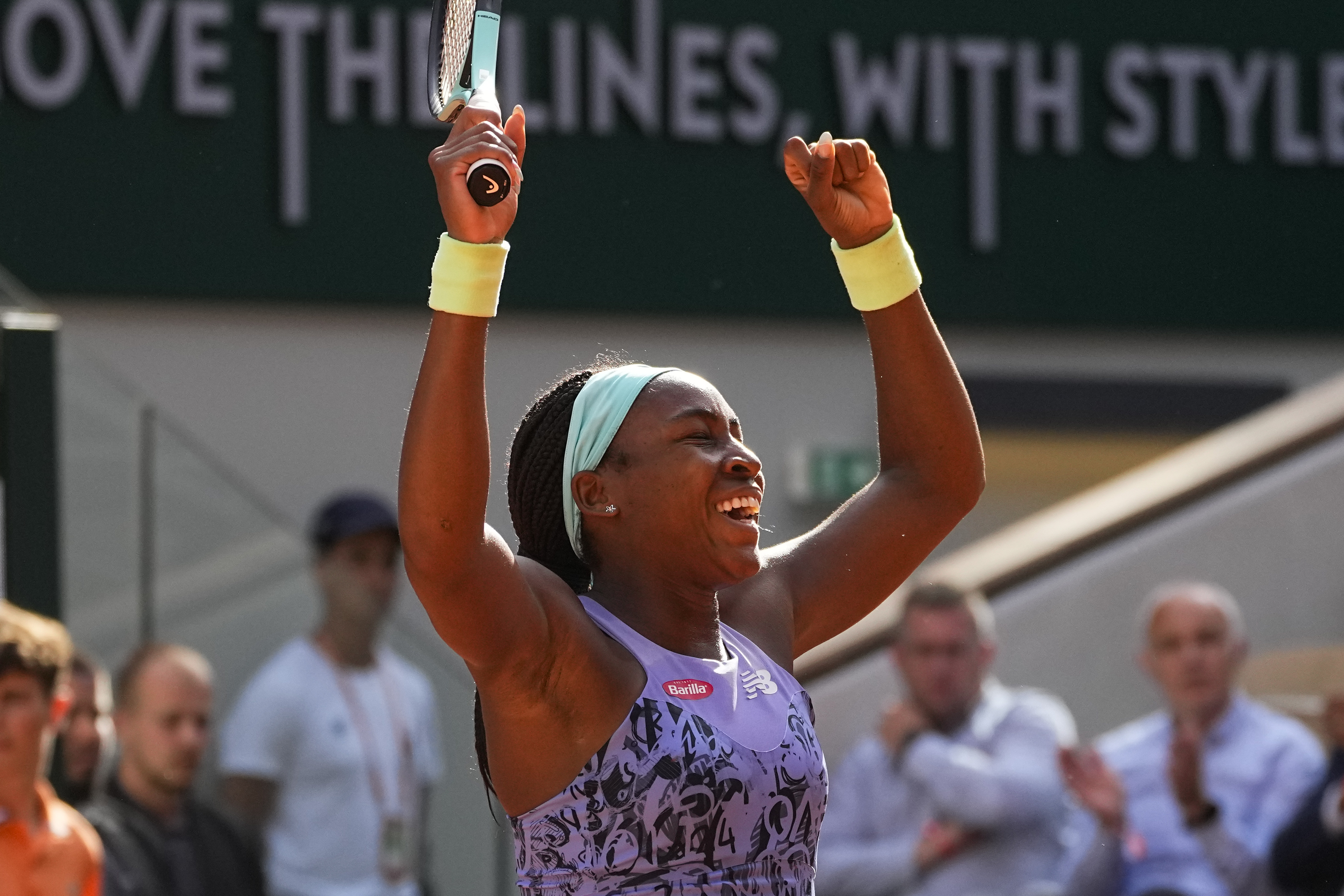 Coco Gauff of the U.S. celebrates winning her semifinal match against Italy's Martina Trevisan in two sets, 6-3, 6-1, at the French Open tennis tournament in Roland Garros stadium in Paris, France, Thursday, June 2, 2022. 