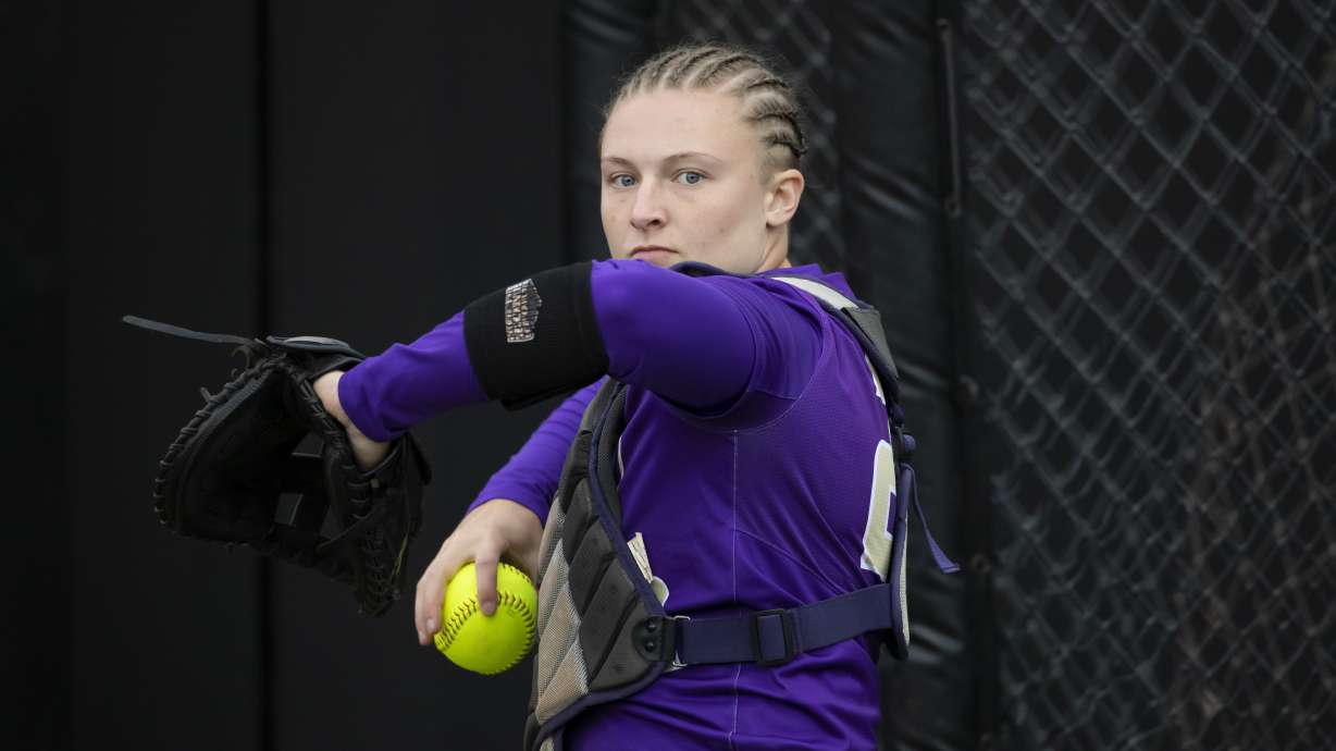 FILE - James Madison catcher Lauren Bernett throws during an NCAA college softball game on May 28, 2021, in Columbia, Mo. Five college athletes, including Meyer, took their own lives in the spring, sparking concerns that schools were not doing enough for some of their higher-profile students.
