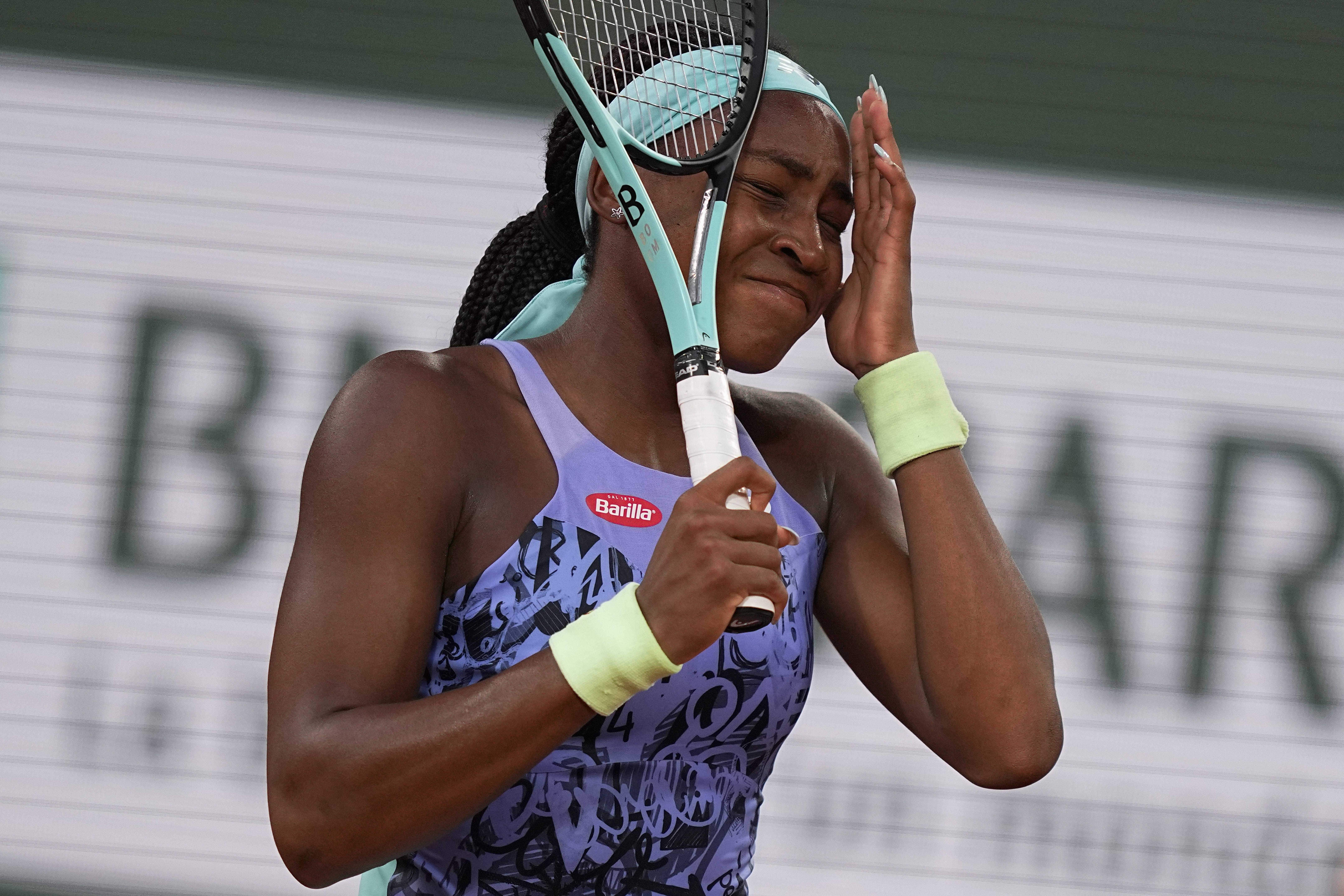 Coco Gauff of the U.S. reacts after missing a shot against Poland's Iga Swiatek during the final match at the French Open tennis tournament in Roland Garros stadium in Paris, France, Saturday, June 4, 2022. 
