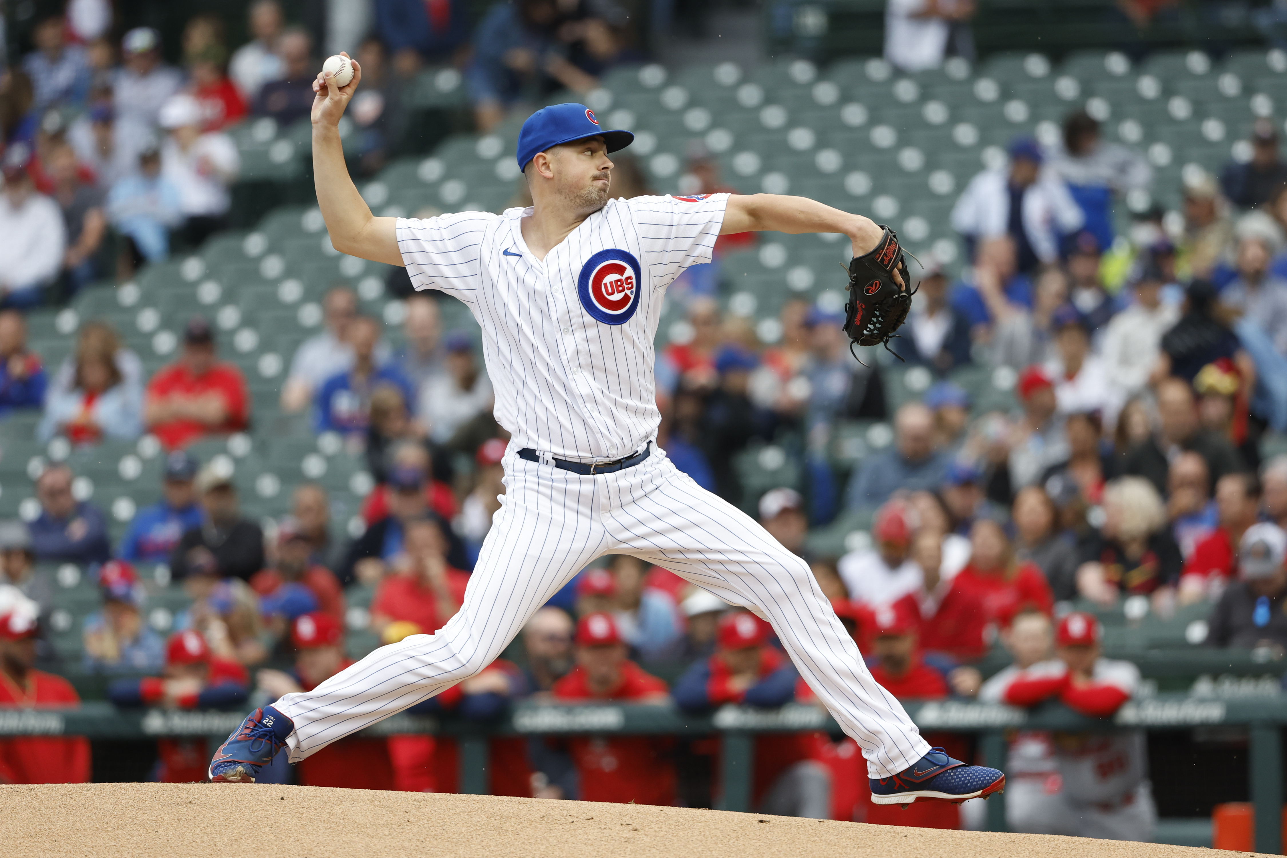 Chicago Cubs starting pitcher Matt Swarmer delivers against the St. Louis Cardinals during the first inning of the first baseball game of a doubleheader, Saturday, June 4, 2022, in Chicago. 