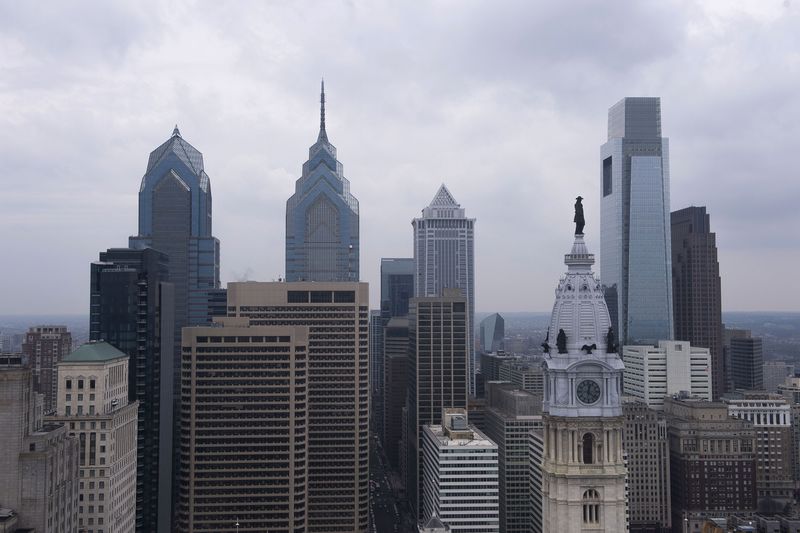 Multiple shooters opened fire in Philadelphia's busy South Street, an area with many bars and restaurants, around midnight on Saturday. Two men and a woman were killed, officials said.