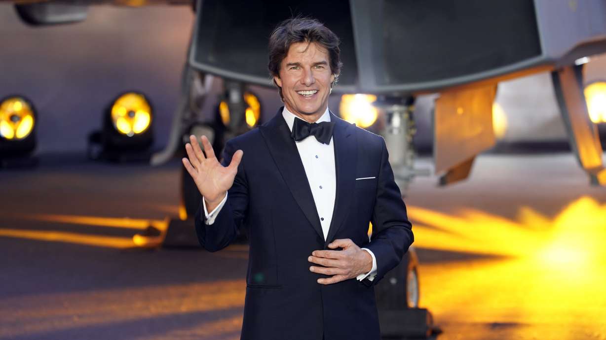 Tom Cruise poses for the media during the "Top Gun Maverick" UK premiere at a central London cinema, on May 19. The movie continued to soar in its second weekend, dropping just 32% from its opening with $86 million in ticket sales, according to studio estimates Sunday.