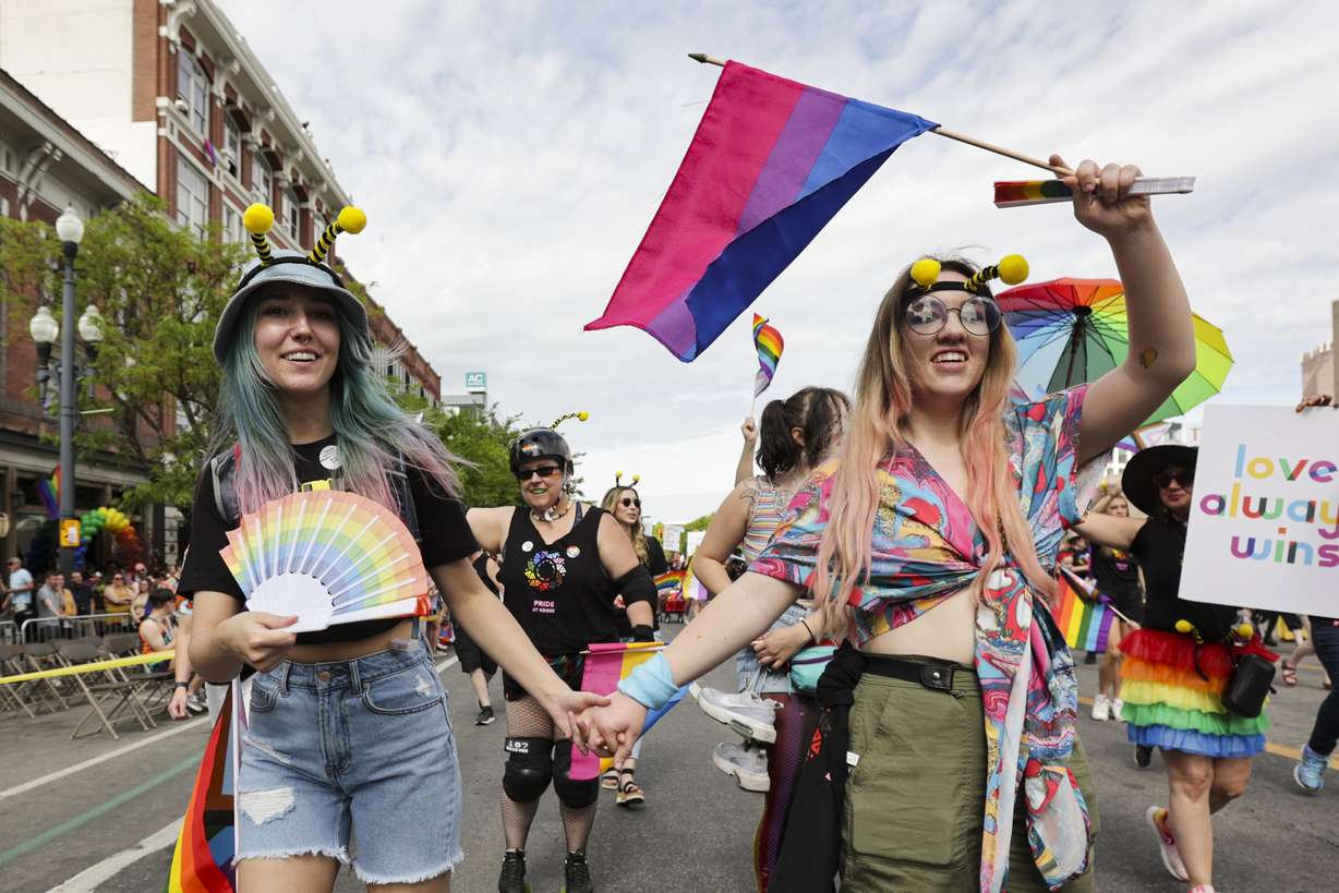 Adobe employees march during the Utah Pride Parade along 200 South in Salt Lake City, Utah on Sunday.