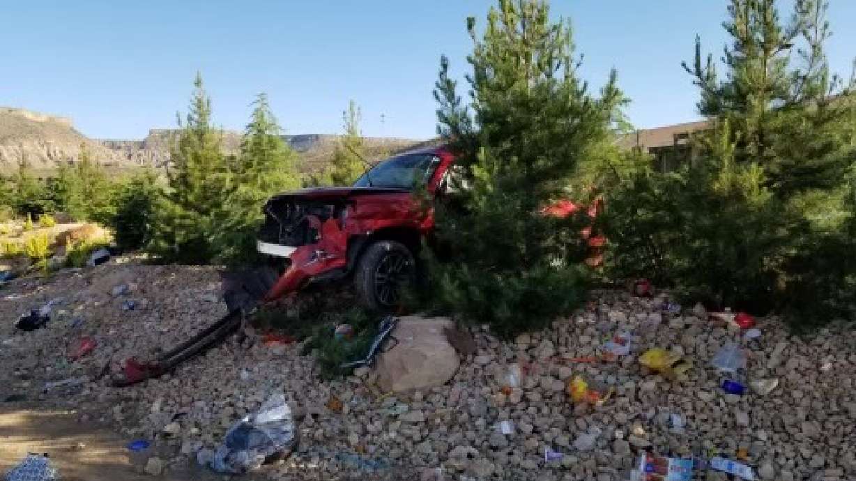 Two people died Sunday when a tour bus and SUV collided in Virgin, Washington County.