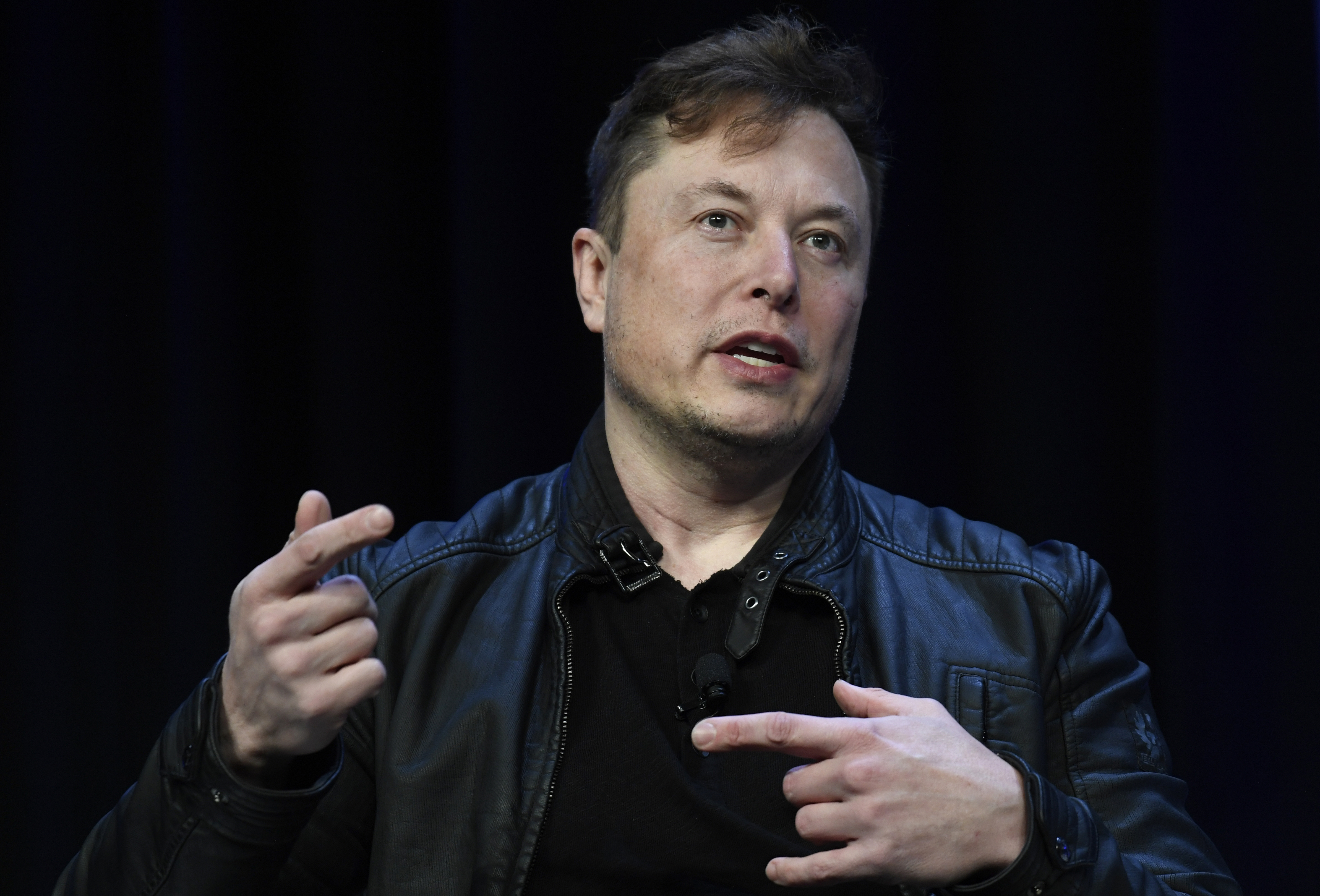 Tesla and SpaceX Chief Executive Officer Elon Musk speaks at the SATELLITE Conference and Exhibition in Washington, on March 9, 2020. Musk is threatening Monday to end his $44 billion agreement to buy Twitter. 