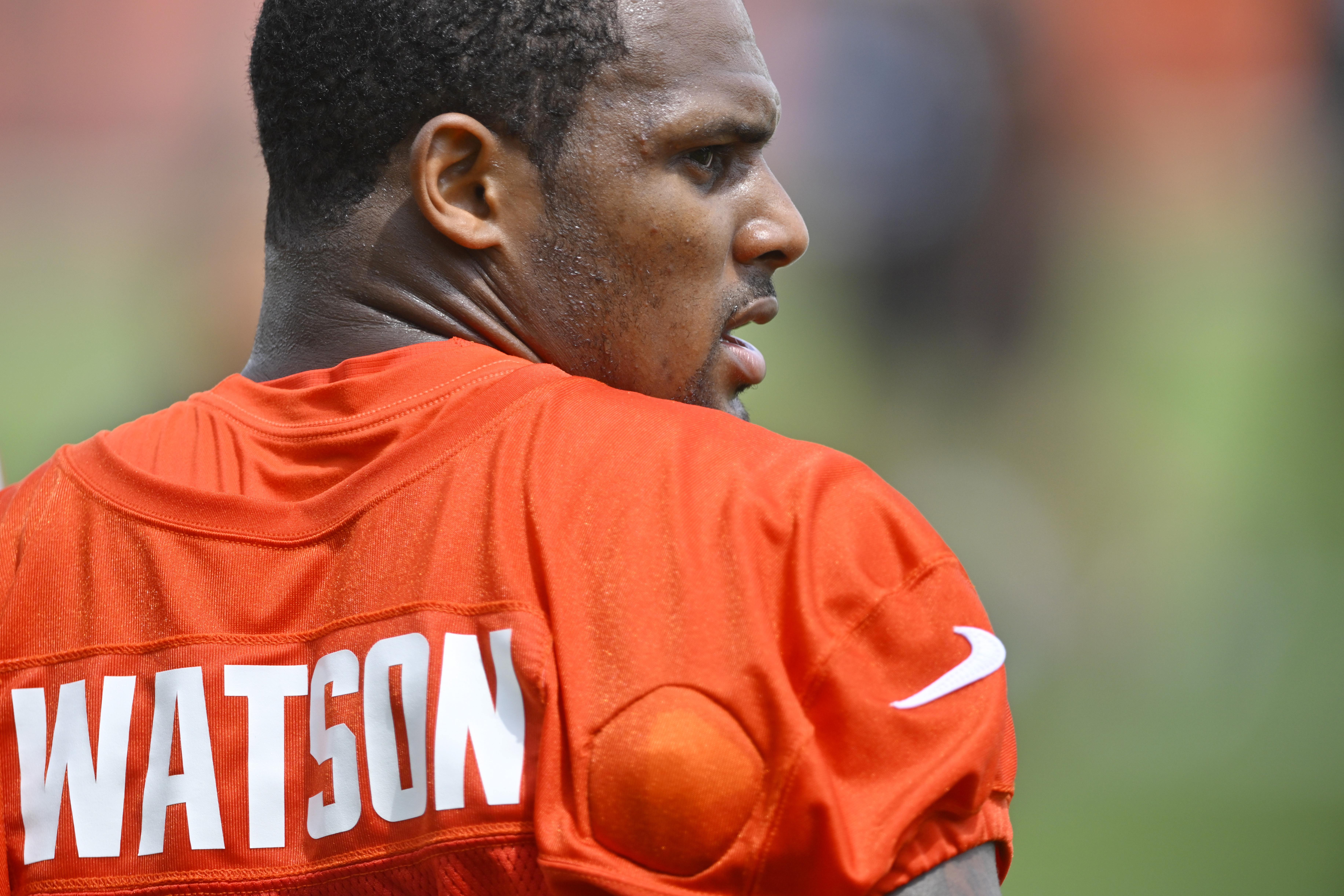 Cleveland Browns quarterback Deshaun Watson stands on the field during an NFL football practice at the team's training facility Wednesday, June 1, 2022, in Berea, Ohio. 