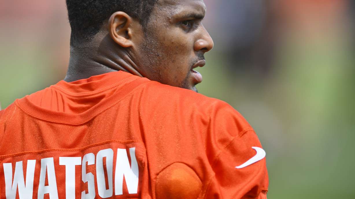 Cleveland Browns quarterback Deshaun Watson stands on the field during an NFL football practice at the team's training facility Wednesday, June 1, 2022, in Berea, Ohio.