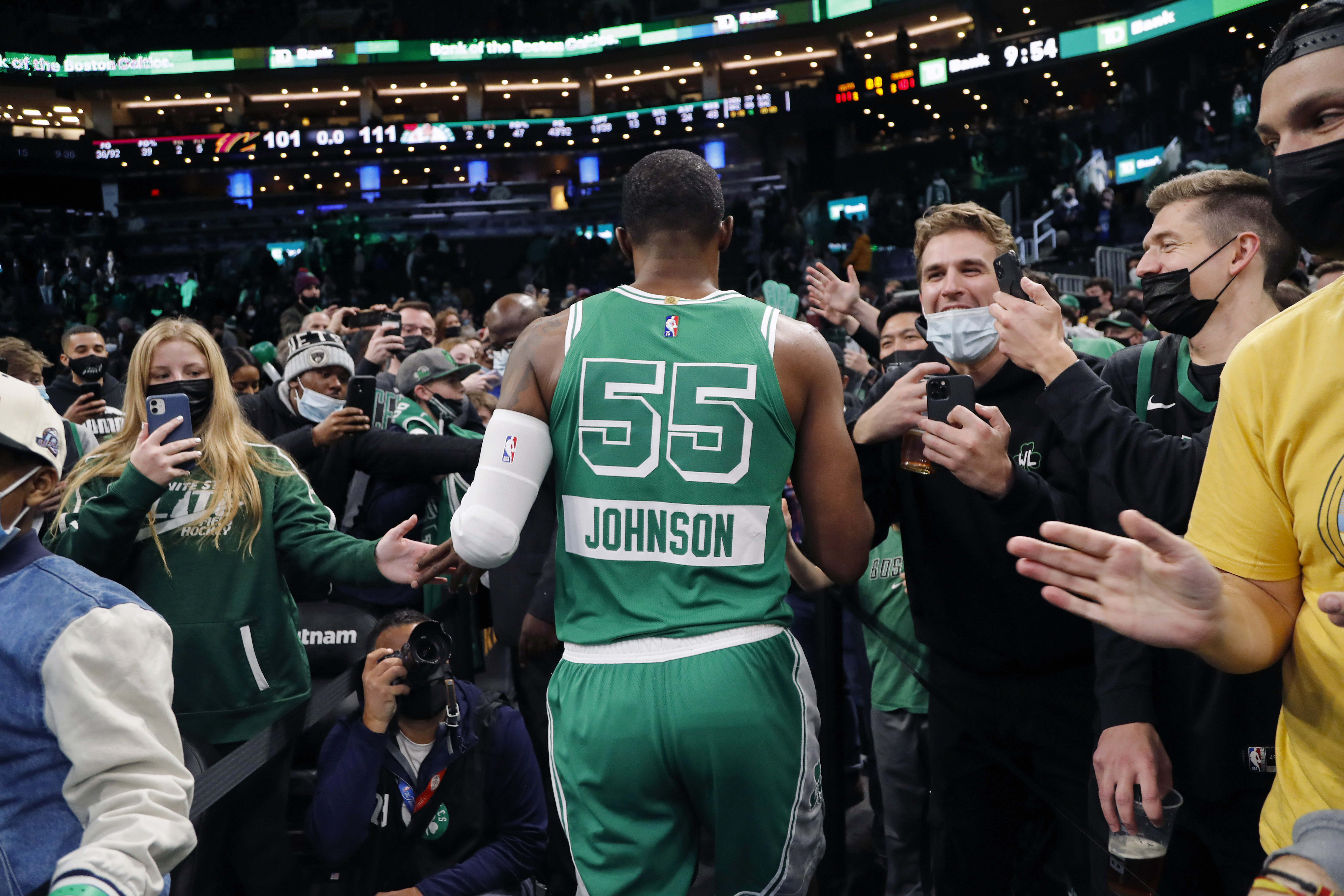 FILE - Boston Celtics' Joe Johnson is cheered by fans as he leaves the court after their win over the Cleveland Cavaliers in an NBA basketball game, Wednesday, Dec. 22, 2021, in Boston. It could be argued the untold MVP's of this season were the more than 100 players signed to short-term hardship contracts to fill in when almost every team was decimated by the Omicron variant and other virus issues in December and January. 