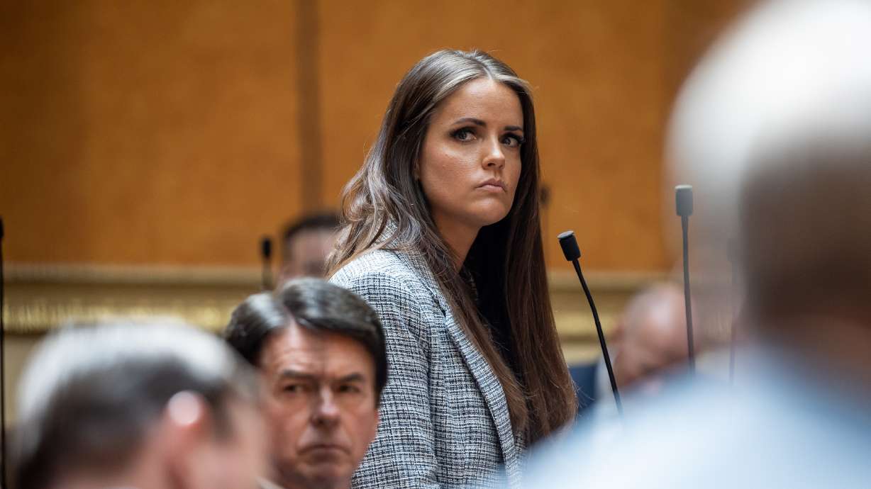 Rep. Kera Birkeland, R-Morgan, listens to another lawmaker at the Capitol in Salt Lake City on March 25. Birkeland spoke out on social media in response to reports that she sent a letter to school administrators regarding transgender students, explaining that she hopes to help protect children.