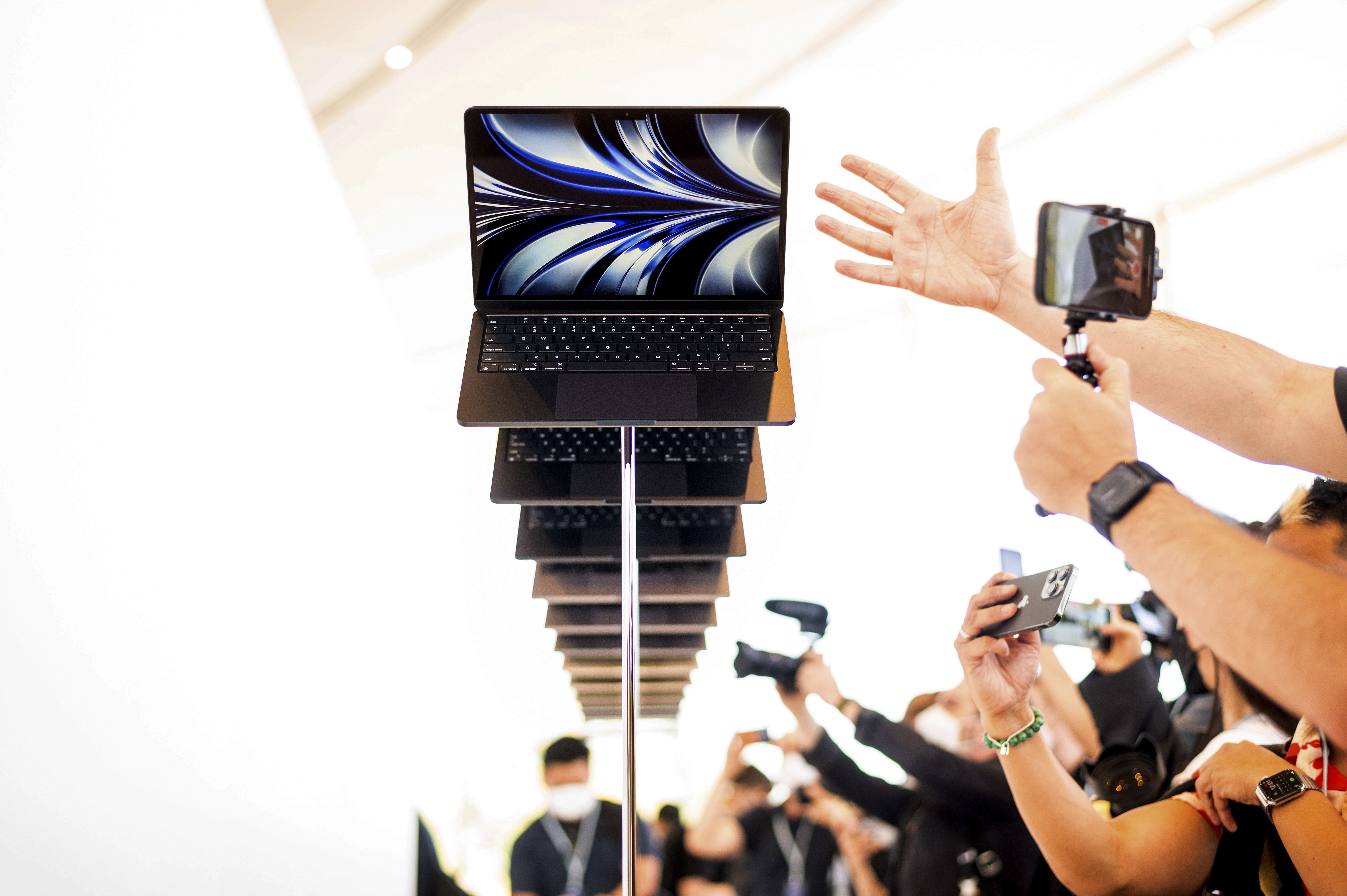 The new Apple MacBook Air with the M2 processor is displayed as visitors take photos of it on Monday, following the keynote presentation of Apple’s World Wide Developer Conference on the campus of Apple’s headquarters in Cupertino, Calif. New Apple features will allow you to reel in that last text or email.