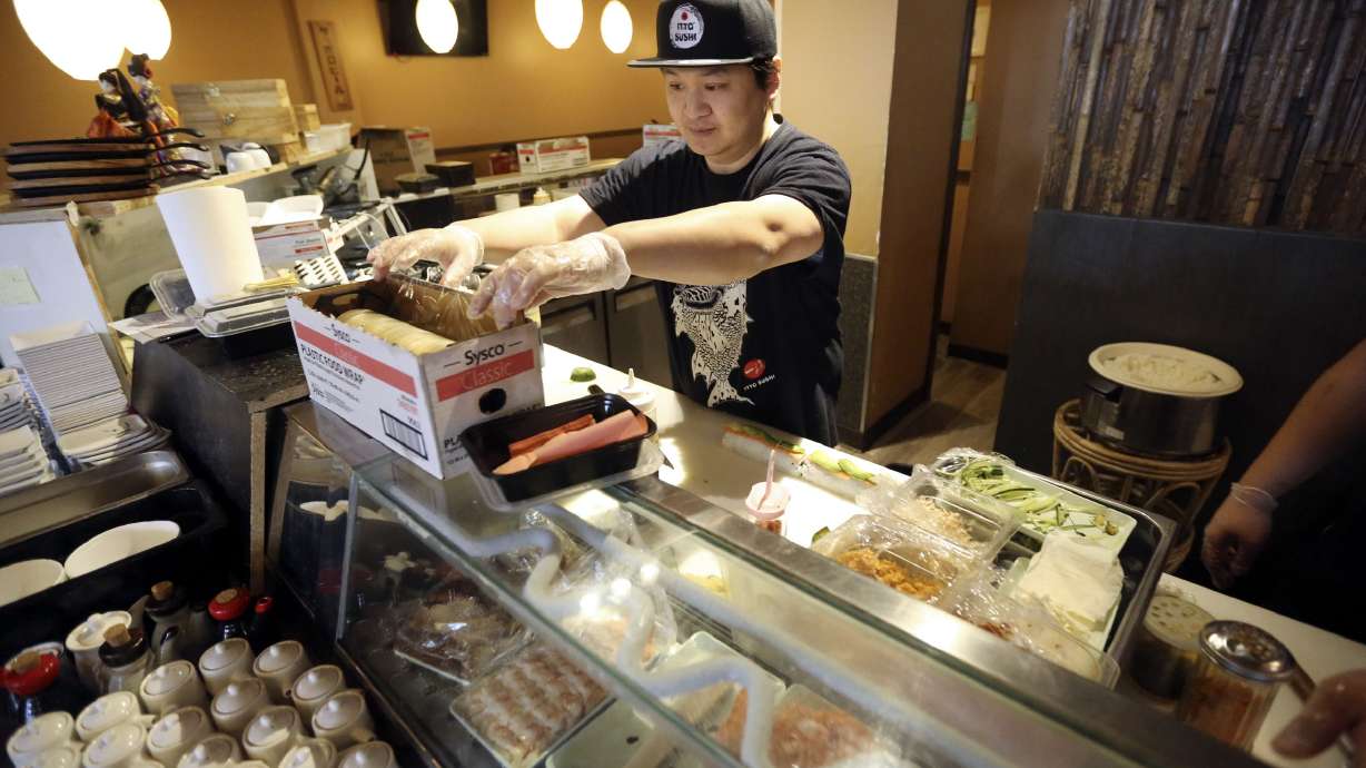 Yong Itto, owner of Itto Sushi in Midvale, prepares sushi for a to-go order on March 25, 2020. The Utah branch of the National Federation for Independent Business last week released the voting records of state lawmakers' votes on seven issues of small-business importance taken during the 2021-2022 session of the Utah Legislature, which indicate that Utah could be the most small-business-friendly state in the nation.