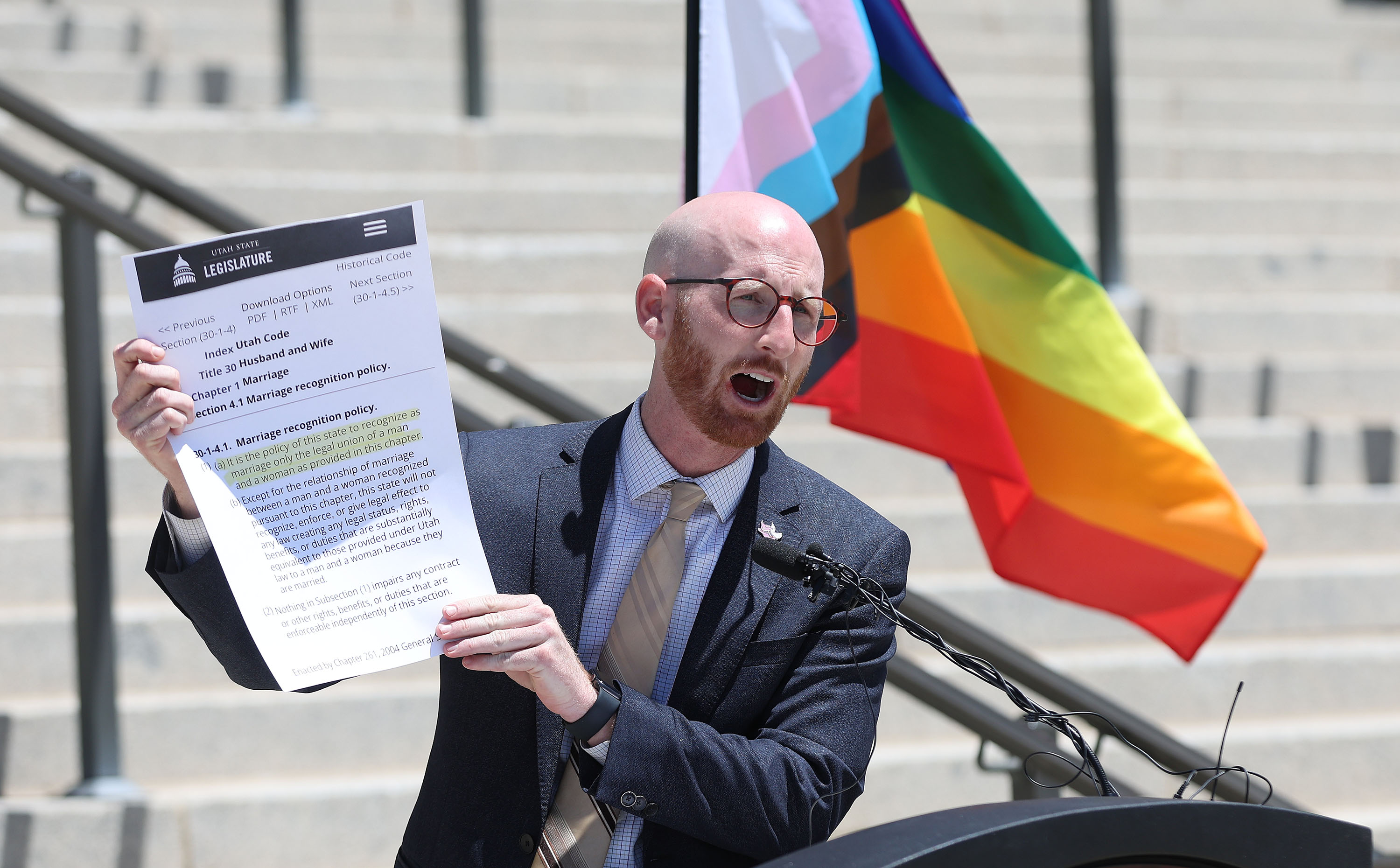 Sen. Derek Kitchen, D-Salt Lake City, holds a copy of Utah code regarding marriage recognition policy during a press conference about same-sex marriage at the Capitol in Salt Lake City on Tuesday.