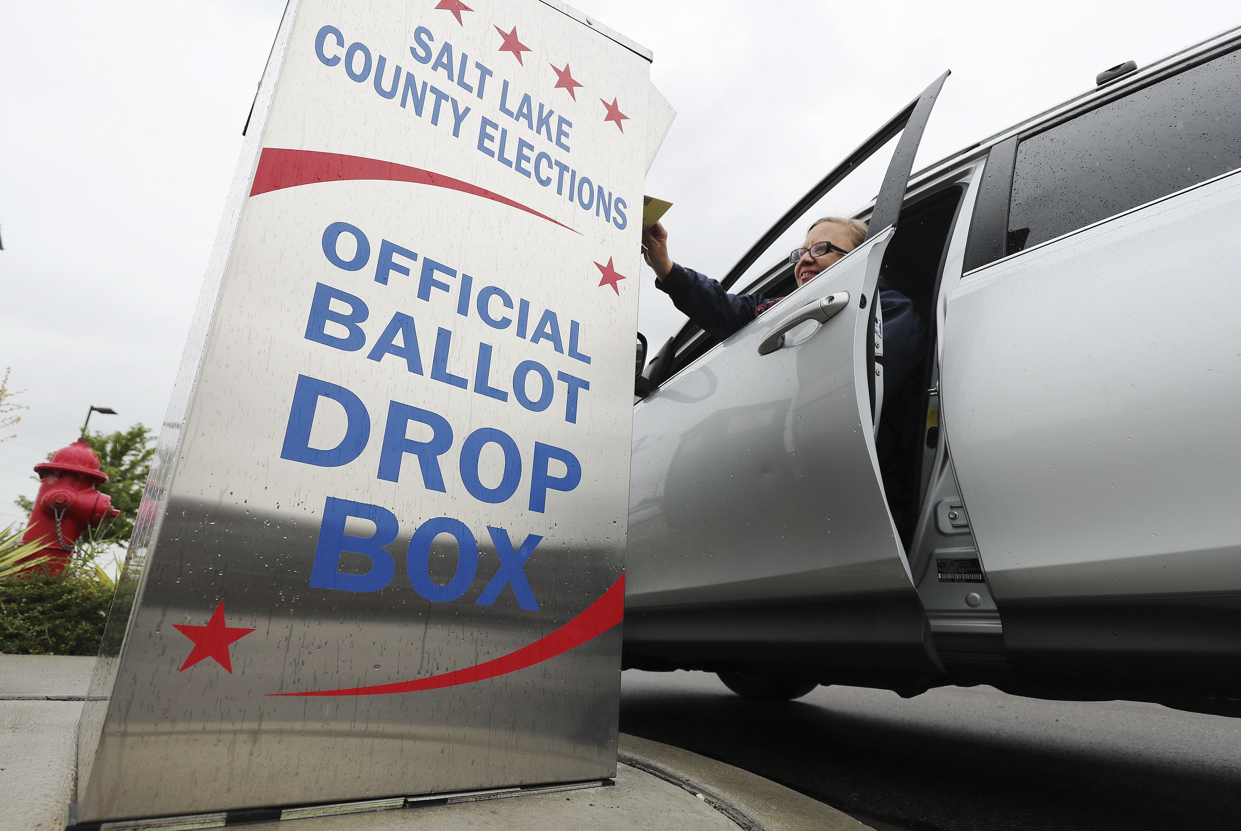 Melinda Tooley drops off her primary ballot at Midvale City Hall in Midvale on June 30, 2020. On Tuesday, county clerks across Utah began mailing ballots for the state’s June 28 primary elections.