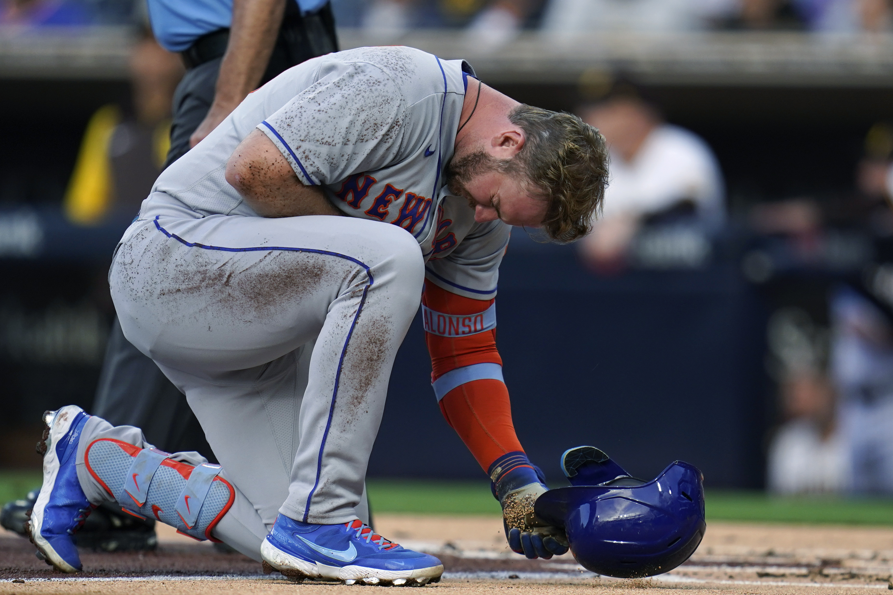 New York Mets' Pete Alonso reacts after being hit by a pitch while batting during the second inning of the team's baseball game against the San Diego Padres on Tuesday, June 7, 2022, in San Diego. 