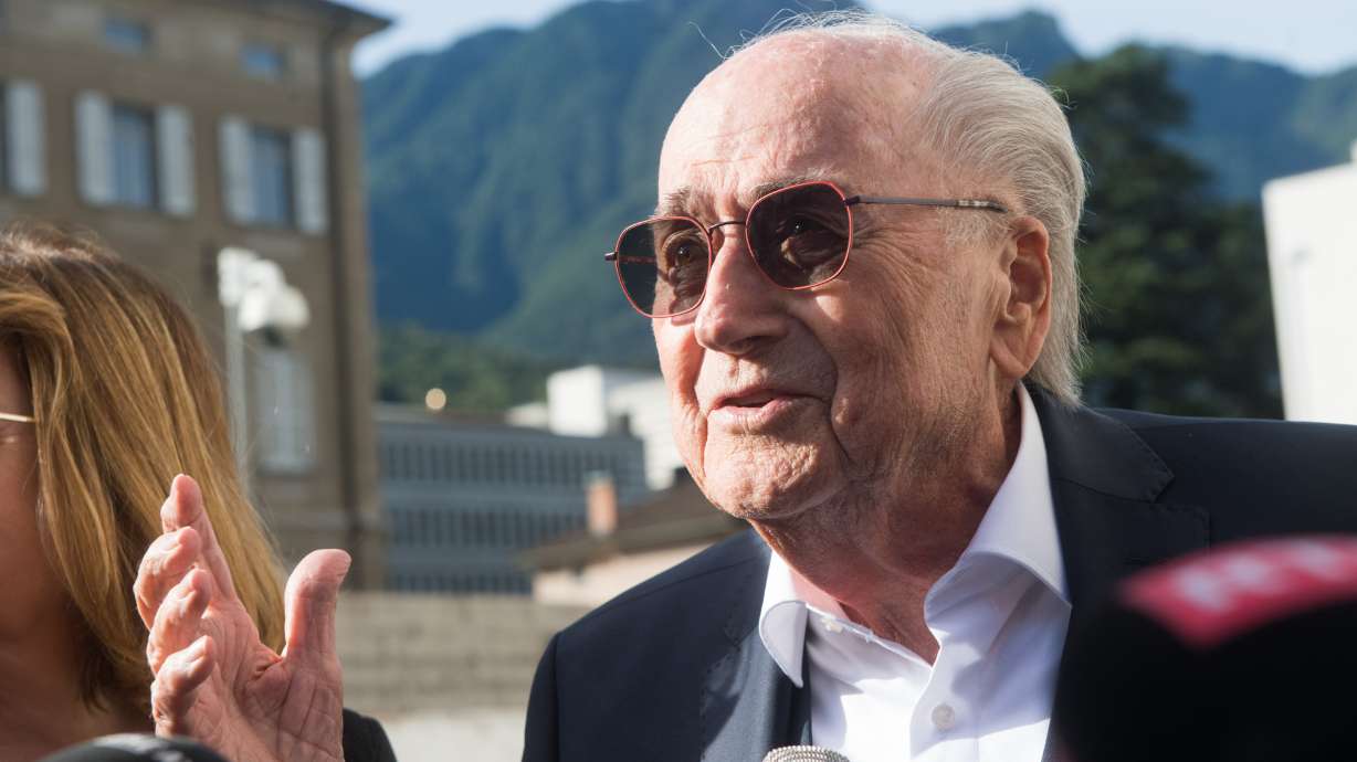 The former president of the World Football Association (FIFA), Joseph Blatter, gestures as he arrives at the Swiss Federal Criminal Court in Bellinzona, Switzerland, Wednesday, June 8, 2022. Blatter and the former president of the the European Football Association (UEFA), Michel Platini, will stand trial before the Federal Criminal Court from Wednesday, over a suspicious two-million payment.