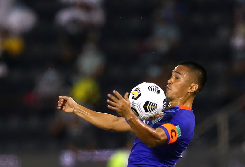 FILE PHOTO: World Cup - Asia Qualifiers - Second Round - Group E - India v Qatar - Jassim Bin Hamad Stadium, Doha, Qatar - June 3, 2021  India's Sunil Chhetri in action