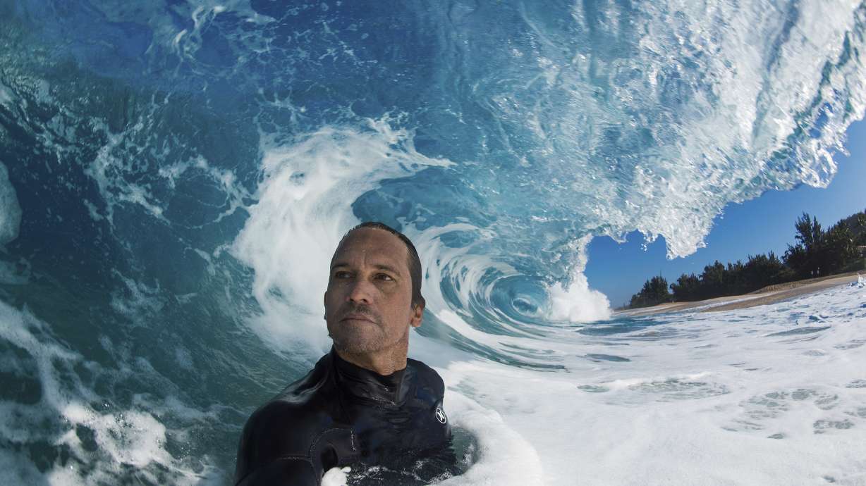 Clark Little takes a selfie as he photographs waves on the North Shore of Oahu near Haleiwa, Hawaii.