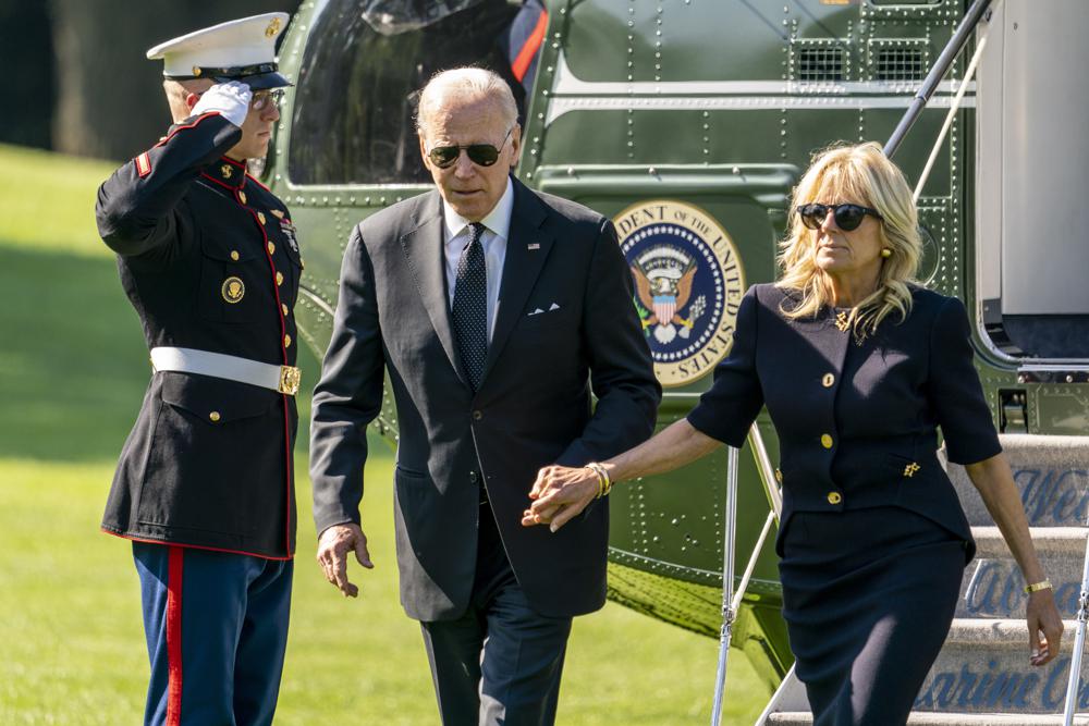 President Joe Biden and first lady Jill Biden arrive on the South Lawn of the White House in Washington, May 30, after returning from Wilmington, Del. The administration is undergoing a period of unusually high staff turnover as President Joe Biden nears 18 months in office.