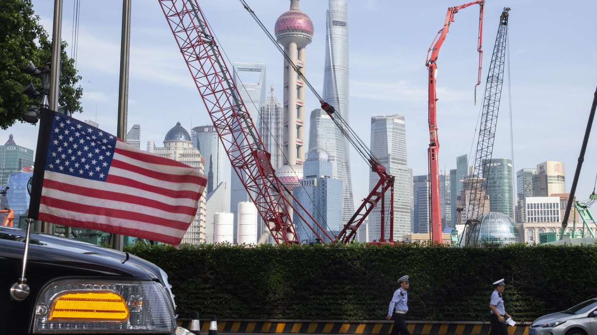 The Shanghai skyline is seen near a U.S. flag on an embassy car outside a hotel where U.S. trade negotiators stayed in Shanghai on July 30, 2019. What are the best strategies for U.S. businesses and policymakers to navigate this seismic shift and stay viable amid dynamic global changes? The China Challenge Summit is aiming to provide some answers.