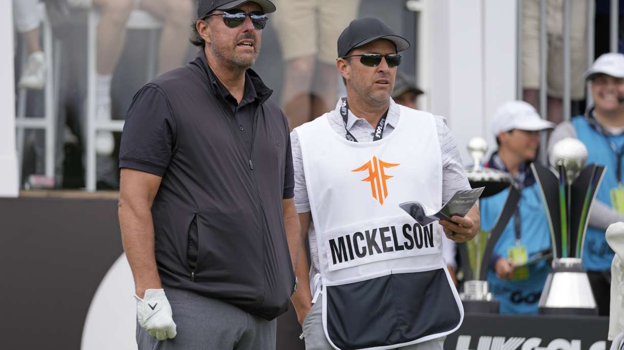 Phil Mickelson of the United States stands on the tee before starting the first round of the inaugural LIV Golf Invitational at the Centurion Club in St. Albans, England, Thursday, June 9, 2022.