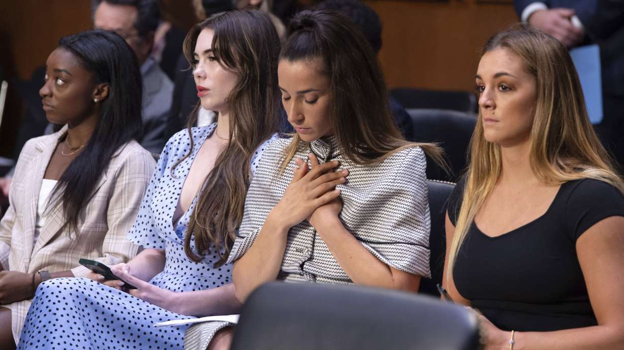 United States gymnasts from left, Simone Biles, McKayla Maroney, Aly Raisman and Maggie Nichols, arrive to testify during a Senate Judiciary hearing about the Inspector General’s report on the FBI’s handling of the Larry Nassar investigation on Capitol Hill, Sept. 15, 2021, in Washington. Biles and dozens of other women who say they were sexually assaulted by Larry Nassar are seeking more than $1 billion from the FBI for failing to stop the sports doctor.