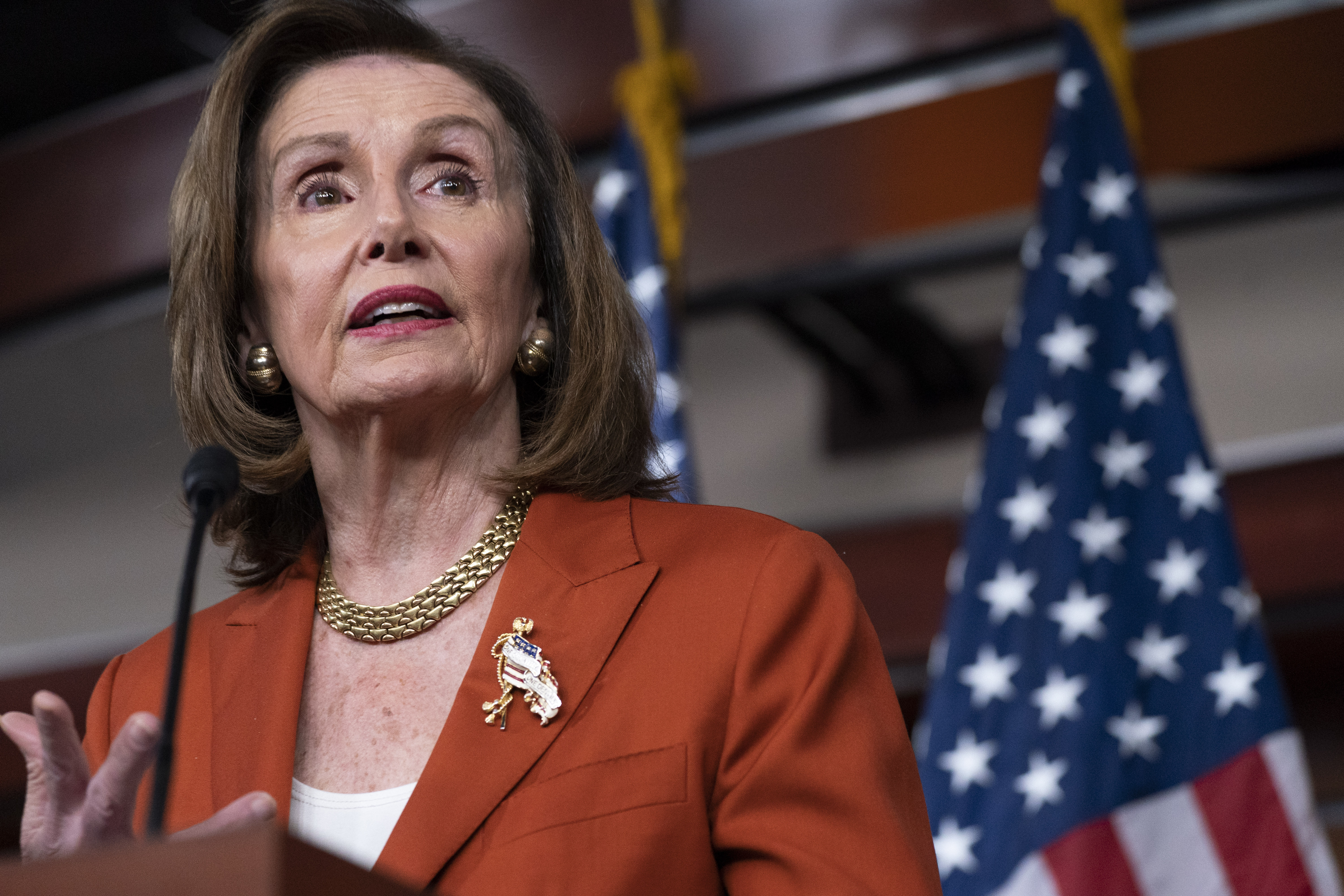 Speaker of the House Nancy Pelosi speaks during a news conference, Thursday, on Capitol Hill in Washington. The House has approved a "red flag" bill that would allow families, police and others to ask federal courts to order the removal of firearms from people believed to be at extreme risk of harming themselves or others.
