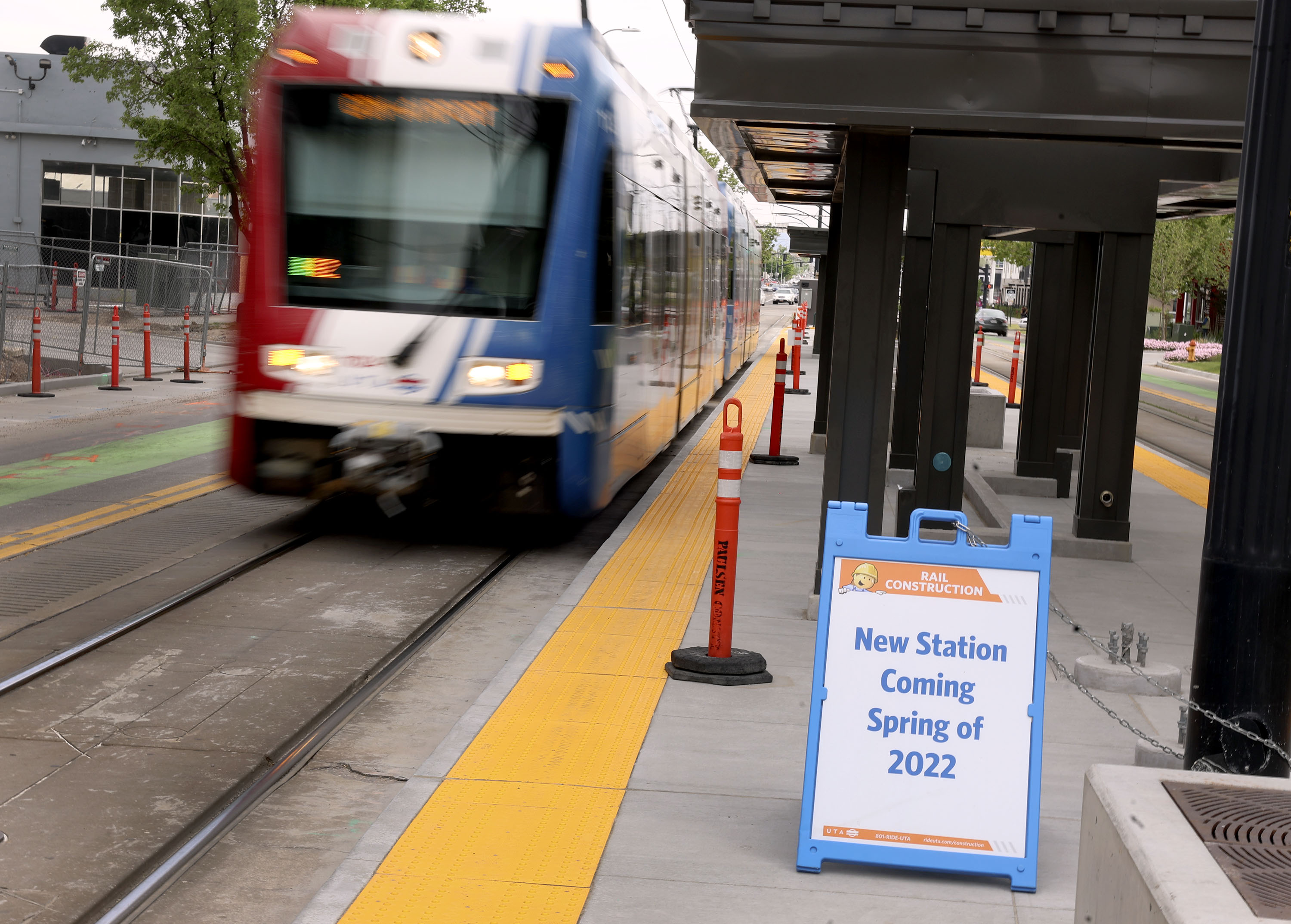 The 600 South TRAX train is pictured in Salt Lake City on Wednesday, June 8, 2022. A sign announces the station is anticipated to open in the spring, though the project has been delayed for months.