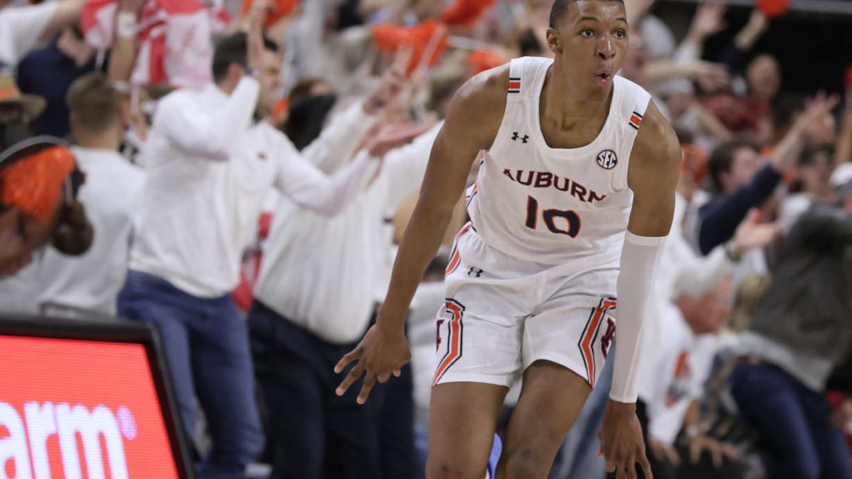 FILE - Auburn forward Jabari Smith (10) reacts after making a 3-pointer against Alabama during the first half of an NCAA college basketball game Tuesday, Feb. 1, 2022, in Auburn, Ala. Houston, Detroit and Orlando share the best odds to win the draft lottery on Tuesday, May 17, 2022, and the No. 1 pick in the NBA draft. All three are already loaded with young players, even before the possibility of adding someone like Chet Holmgren, Paolo Banchero or Jabari Smith.