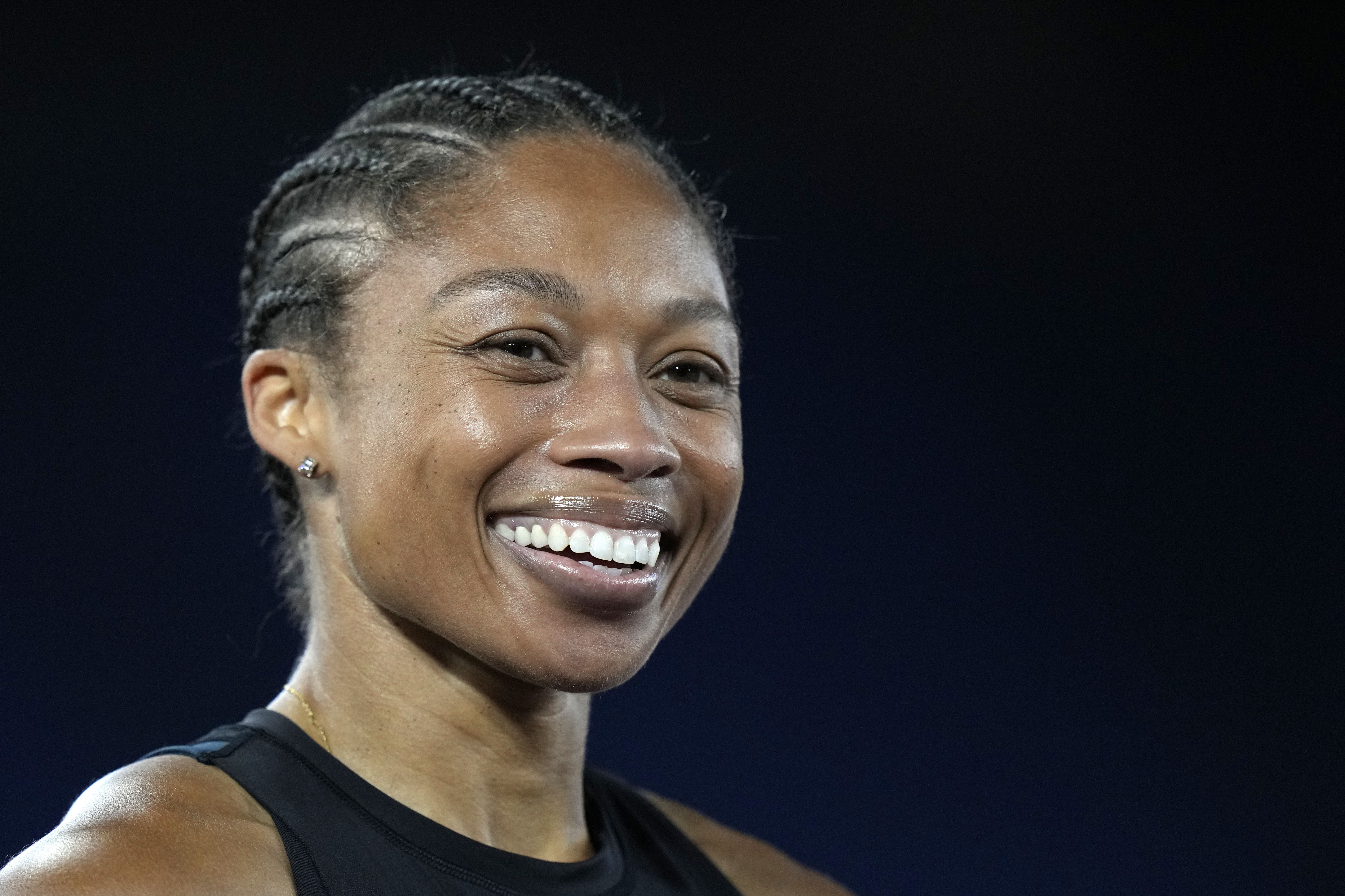 Allyson Felix of the United States smiles at the finish line of the women's 200-meter competition at the Golden Gala Pietro Mennea IAAF Diamond League athletics meeting in Rome, Thursday, June 9, 2022. 