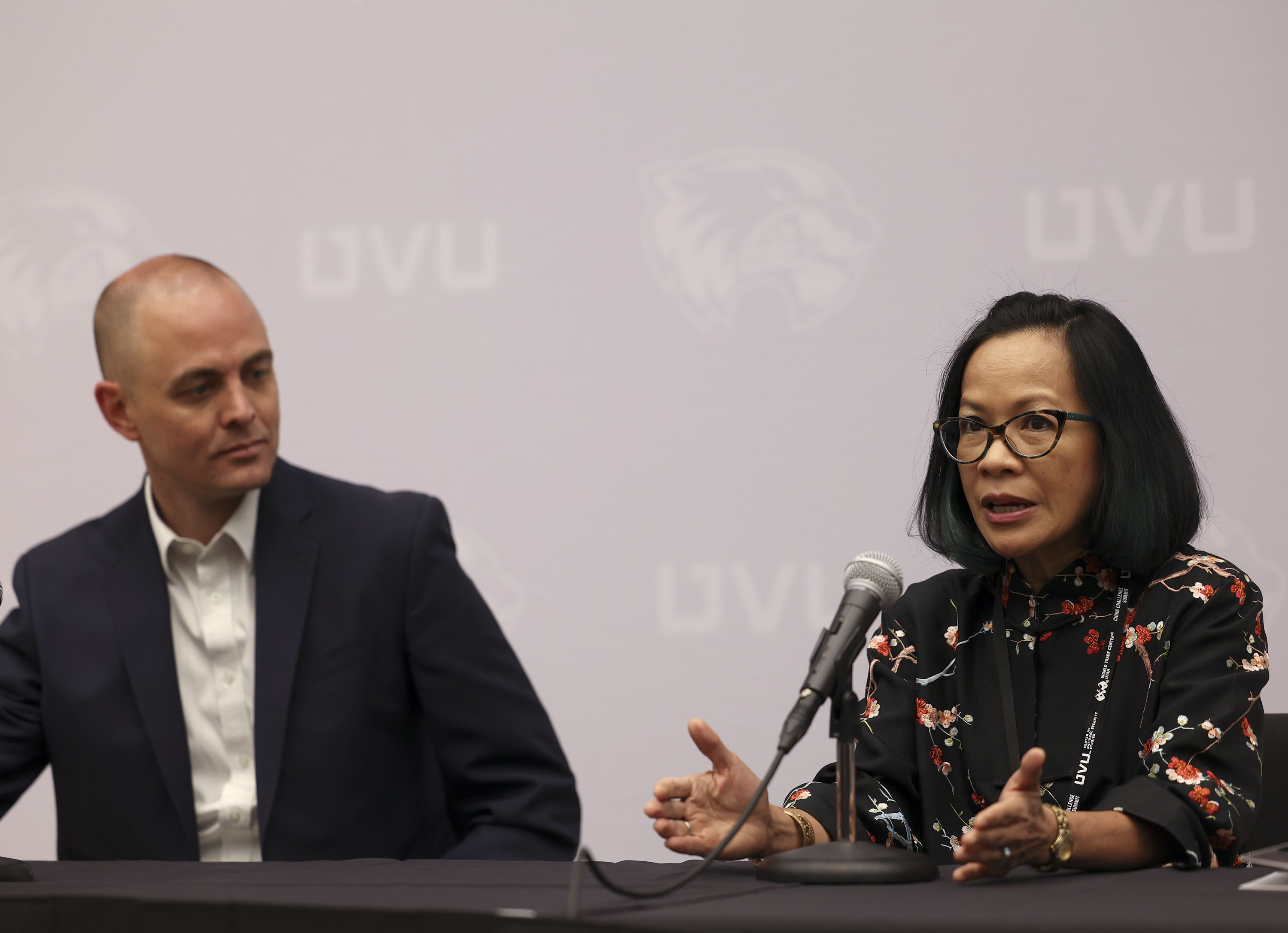 Miles Hansen, president and CEO of World Trade Center Utah, and Astrid Tuminez, president of Utah Valley University, speak to reporters prior to the China Challenge Summit at Utah Valley University in Orem on Thursday.
