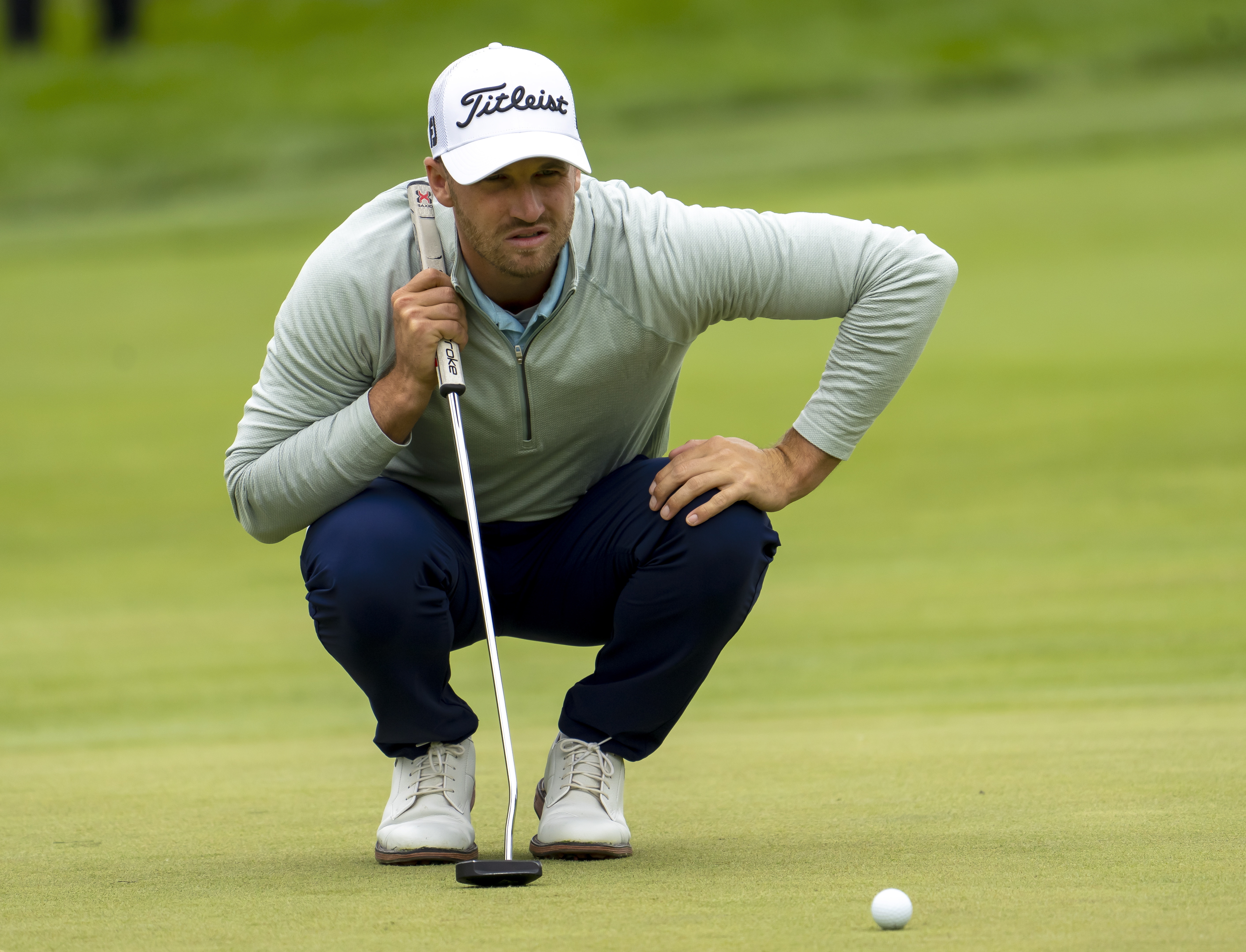 Wyndham Clark lines up his putt on the eighth green during the first round of the Canadian Open golf tournament in Toronto on Thursday, June 9, 2022. 